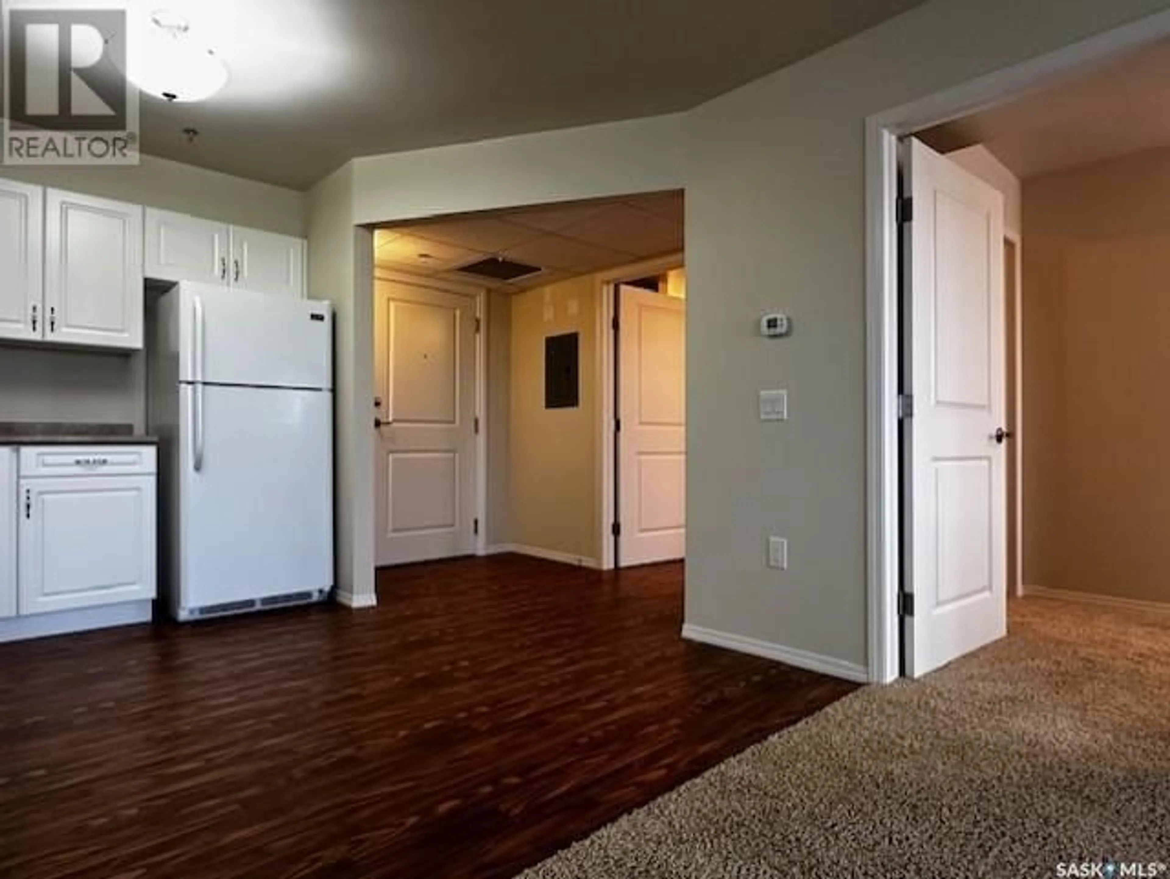 A pic of a room, wood floors for 303 680 7th AVENUE E, Melville Saskatchewan S0A2P1