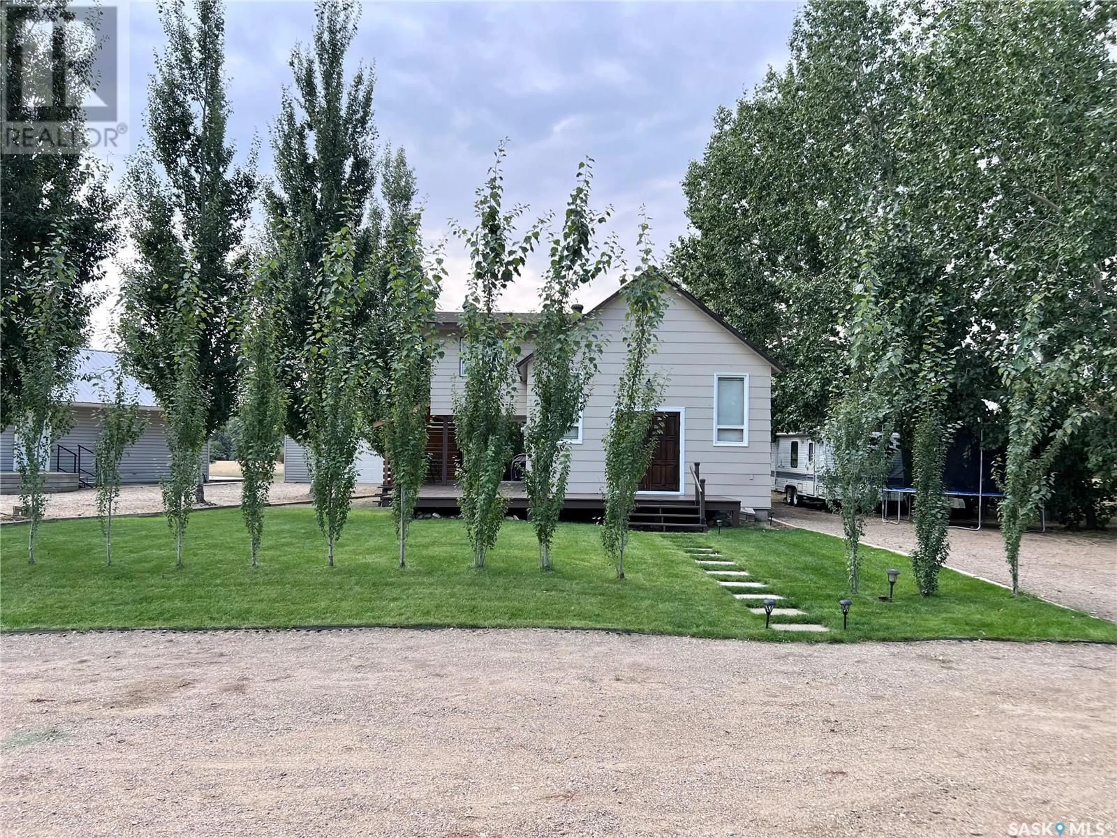 Frontside or backside of a home, the fenced backyard for 307 Ruby DRIVE, Hitchcock Bay Saskatchewan S0L0G0