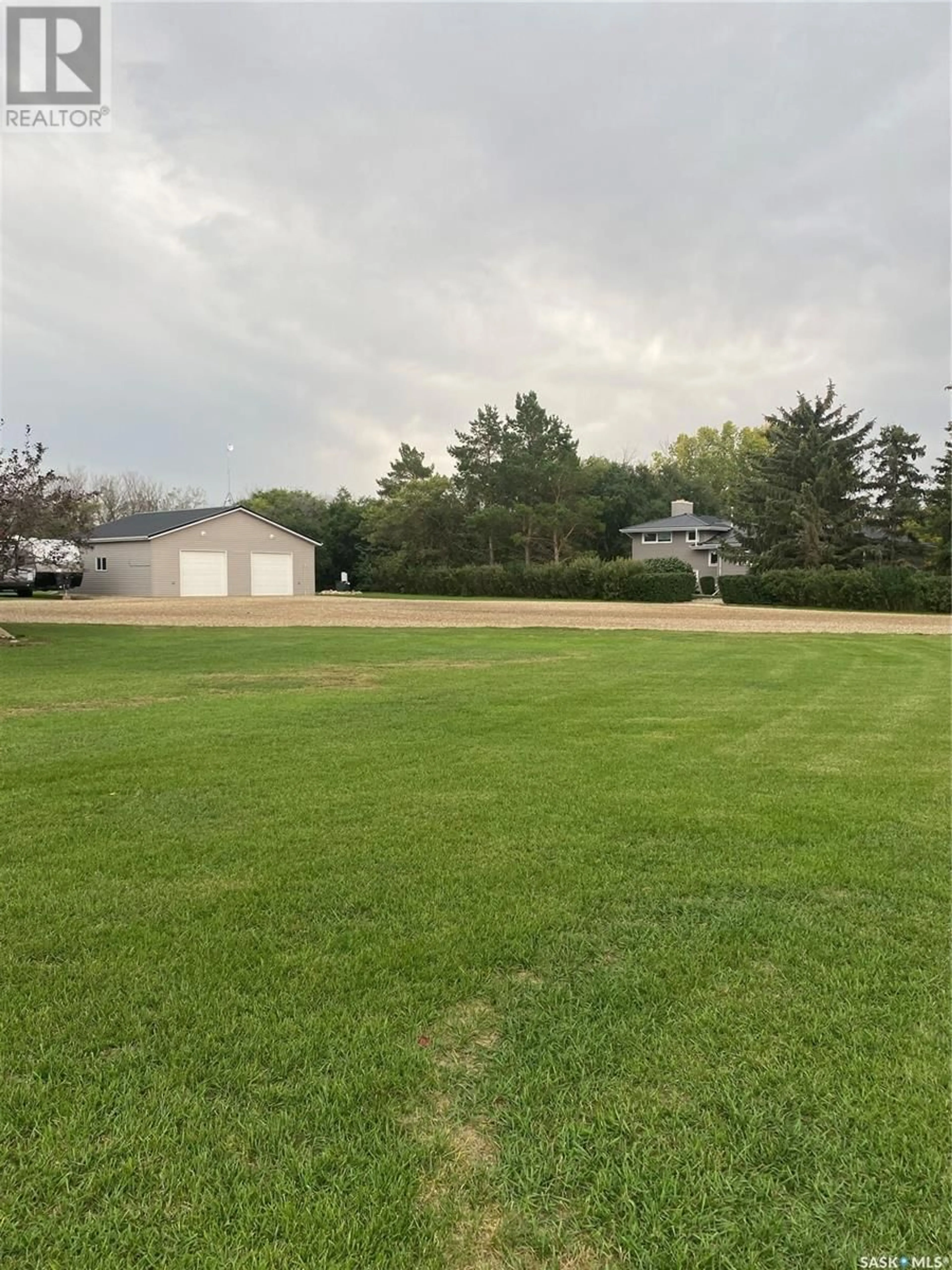 Frontside or backside of a home, the fenced backyard for Fillmore Acreage (13.6 acres), Fillmore Rm No. 96 Saskatchewan S0G4T0