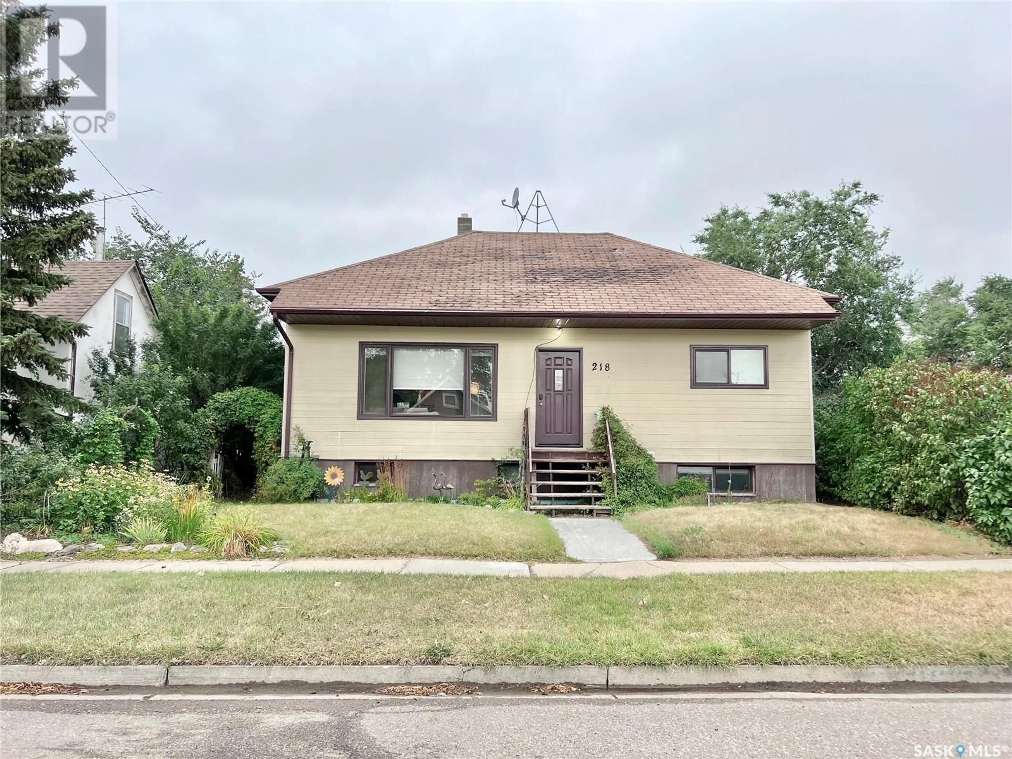 Frontside or backside of a home, cottage for 218 Simpson STREET, Outlook Saskatchewan S0L2N0