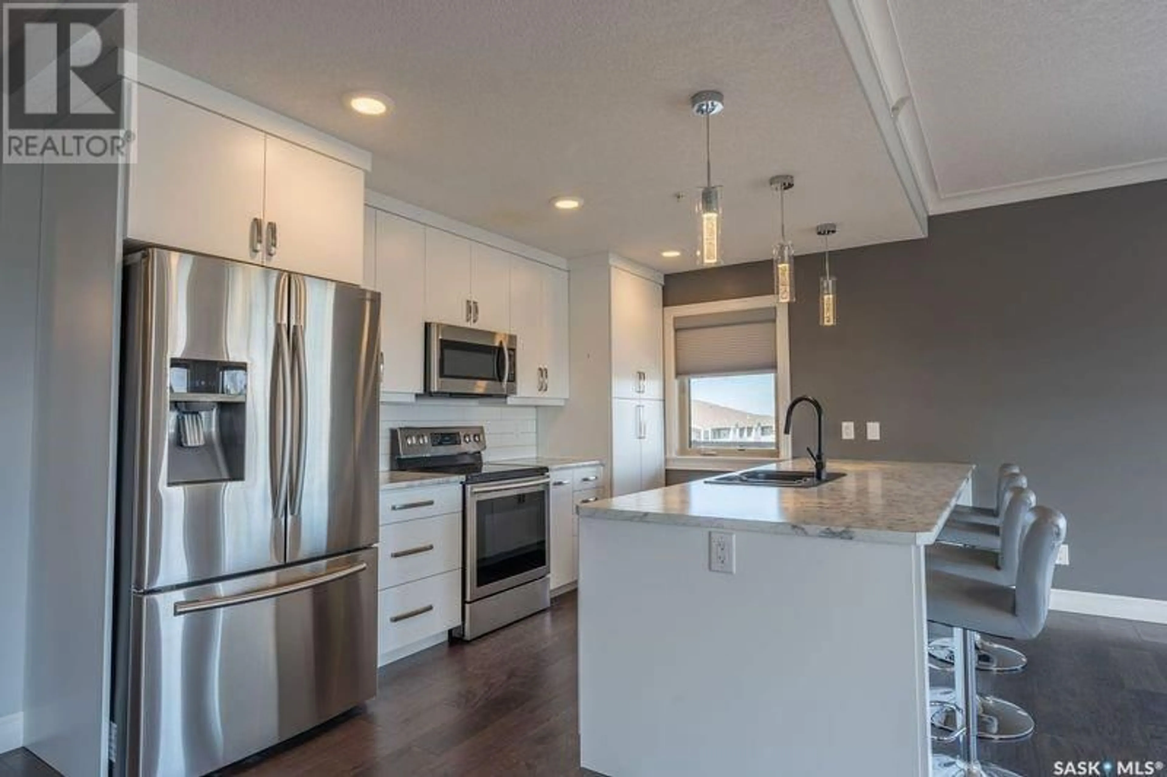 Open concept kitchen, unknown for 308 - 2800 LAKEVIEW DRIVE, Prince Albert Saskatchewan S6W0A4