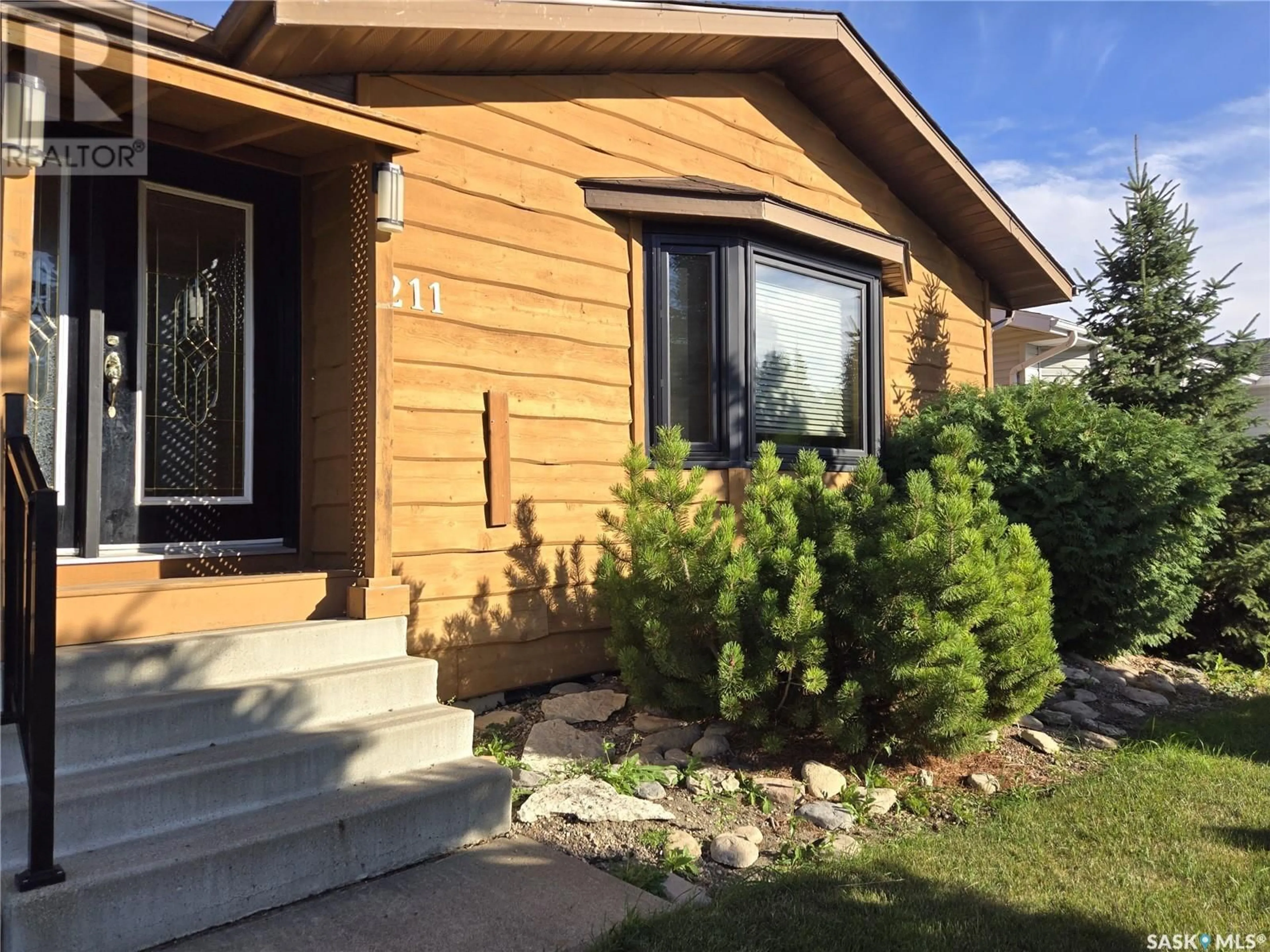 Frontside or backside of a home, cottage for 211 Maple STREET, Outlook Saskatchewan S0L2N0