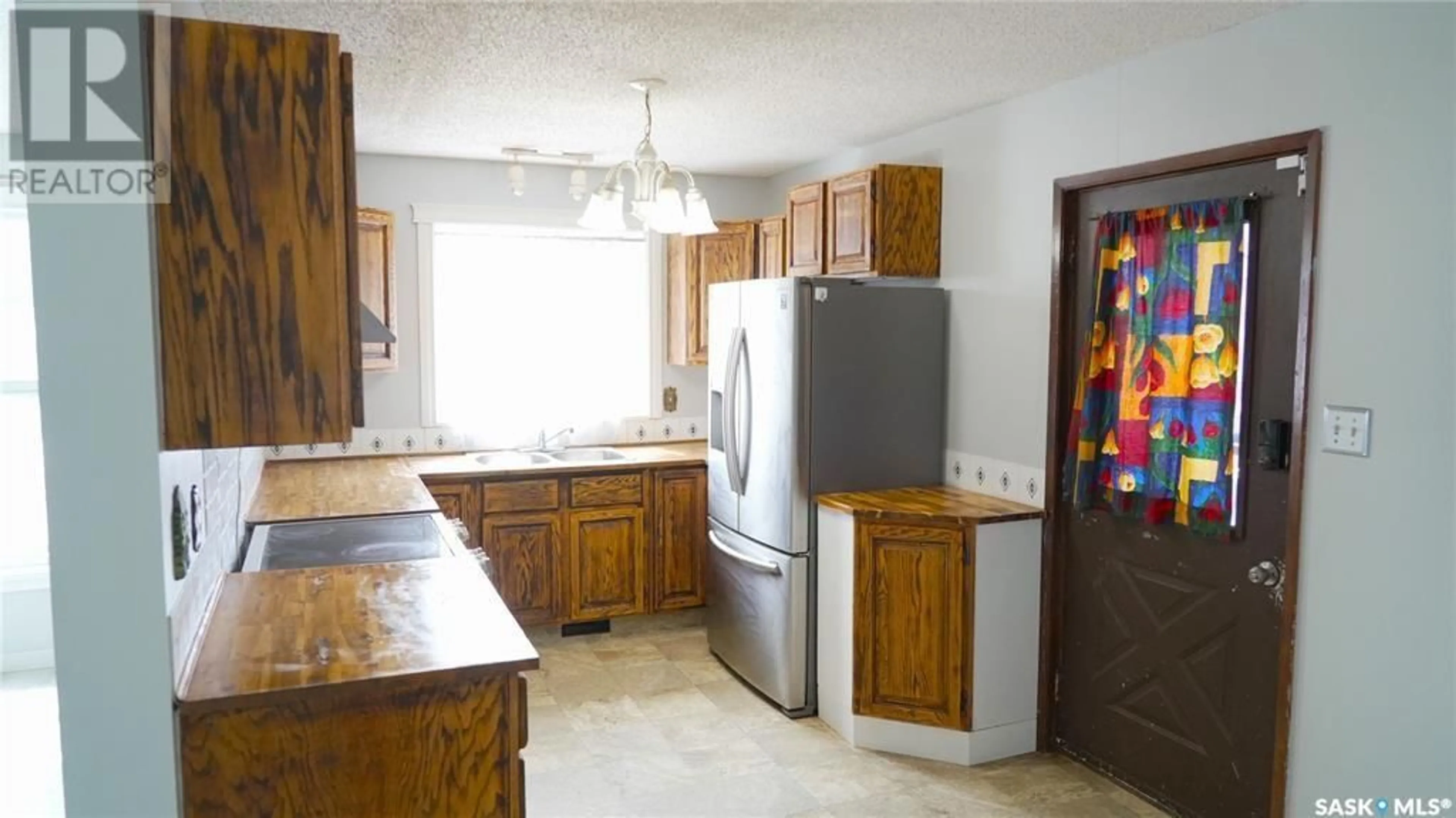 Kitchen, wood floors, cottage for 3434 33rd STREET W, Saskatoon Saskatchewan S7L6C9