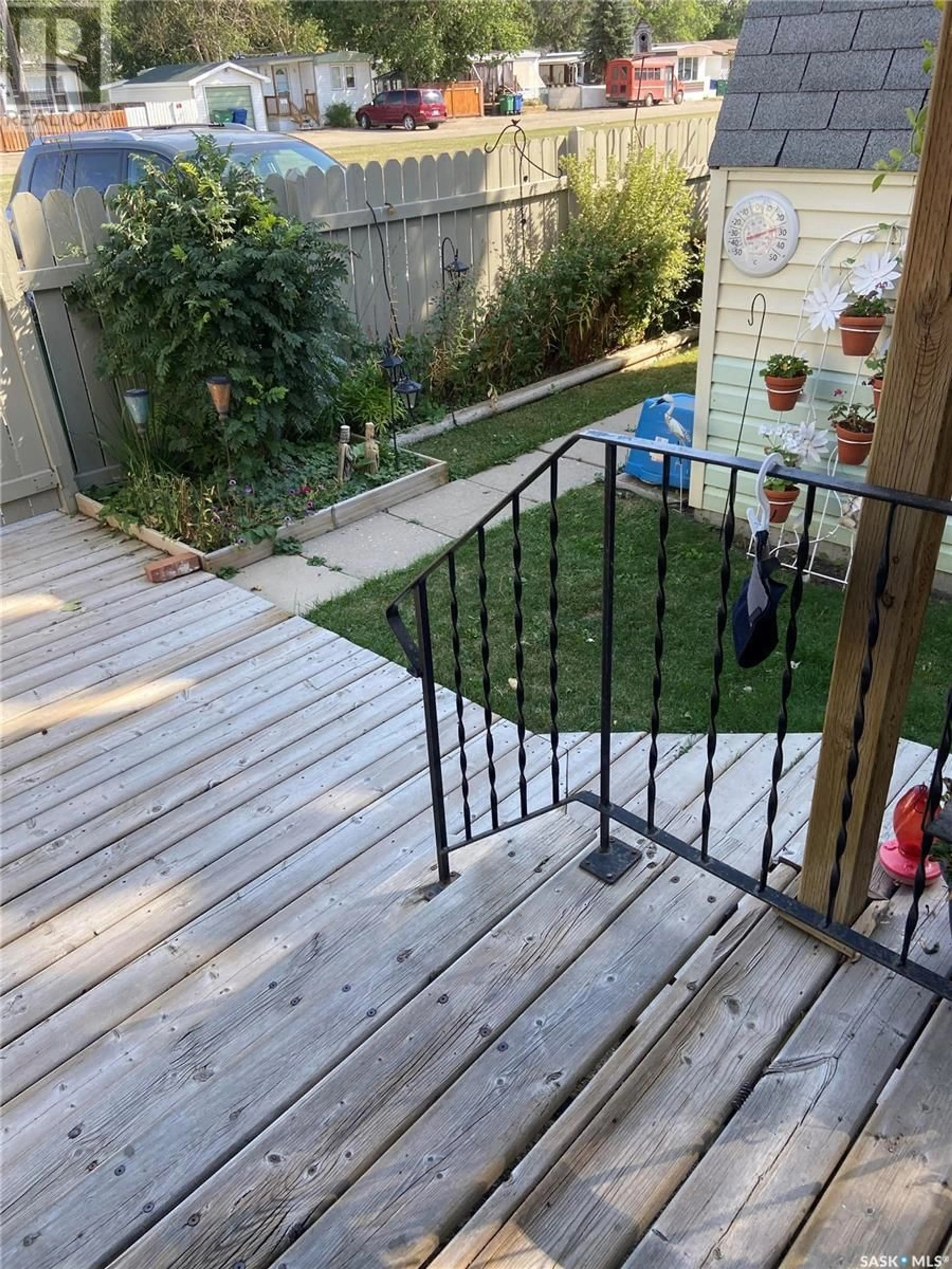 Patio, the fenced backyard for B4 1455 9th AVENUE NE, Moose Jaw Saskatchewan S6J1C6