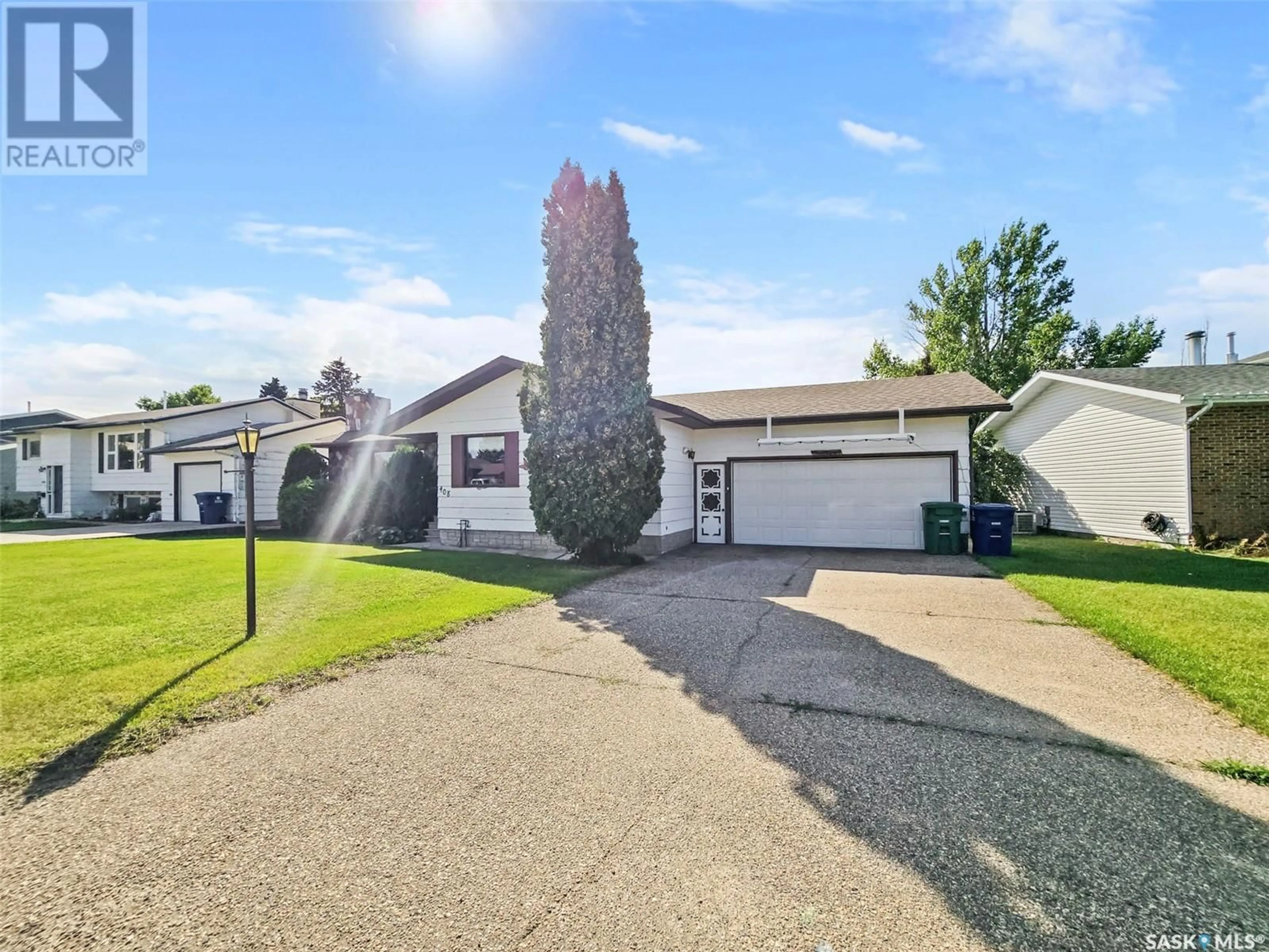 Frontside or backside of a home for 408 8th AVENUE W, Biggar Saskatchewan S0K0M0