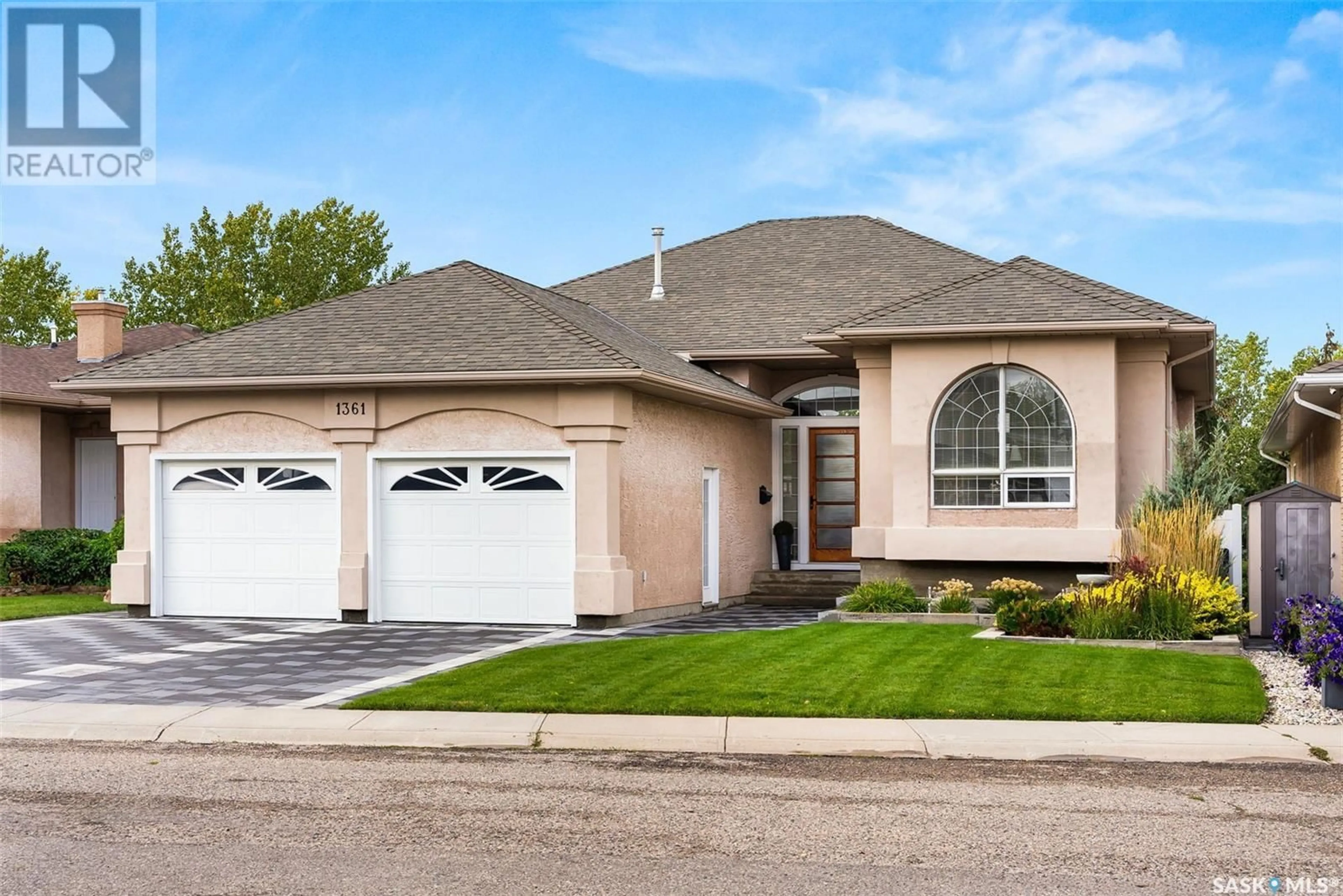 Home with vinyl exterior material for 1361 Lapchuk CRESCENT N, Regina Saskatchewan S4X4L4