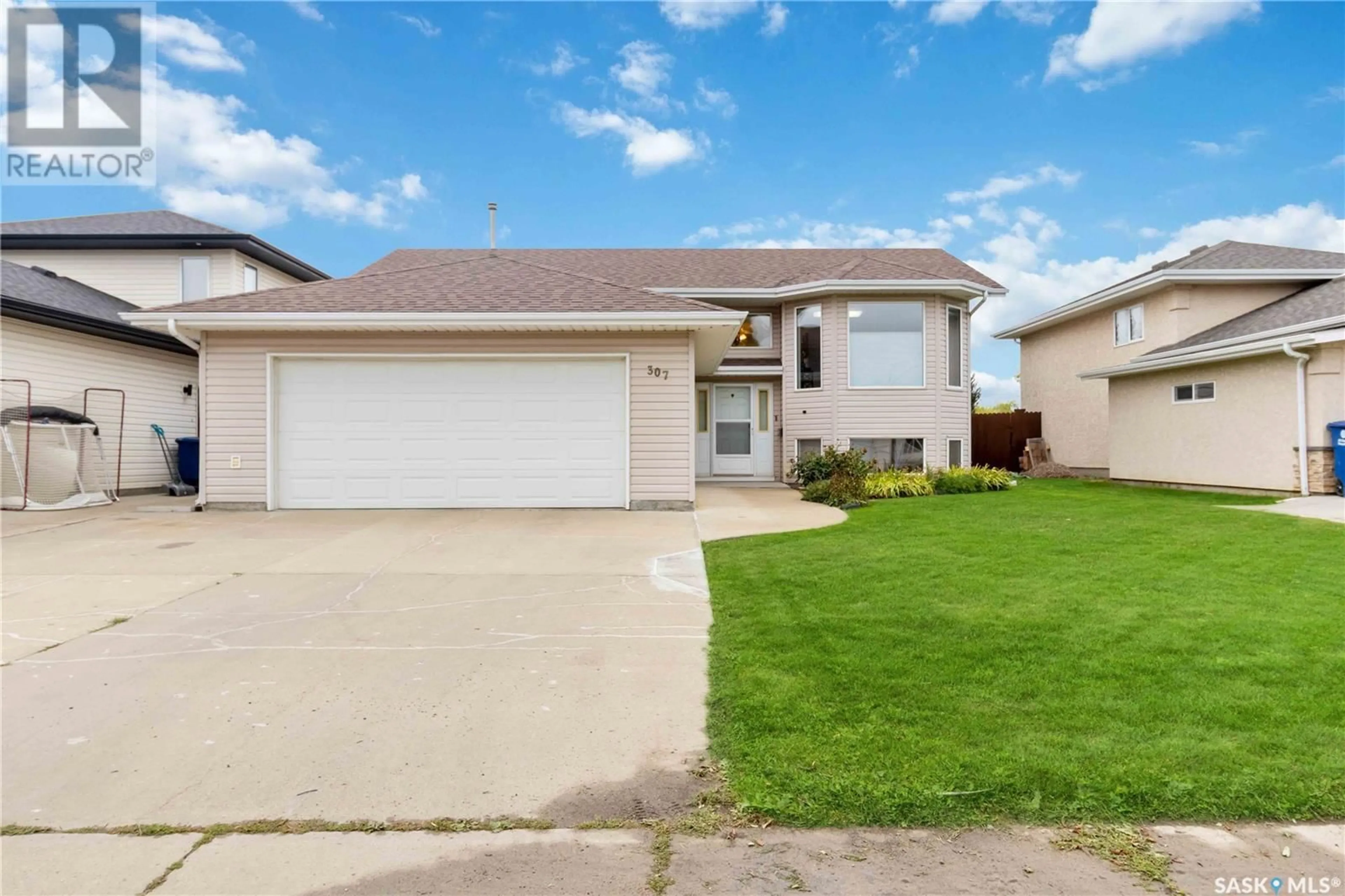 Frontside or backside of a home for 307 3rd AVENUE N, Martensville Saskatchewan S0K2T2