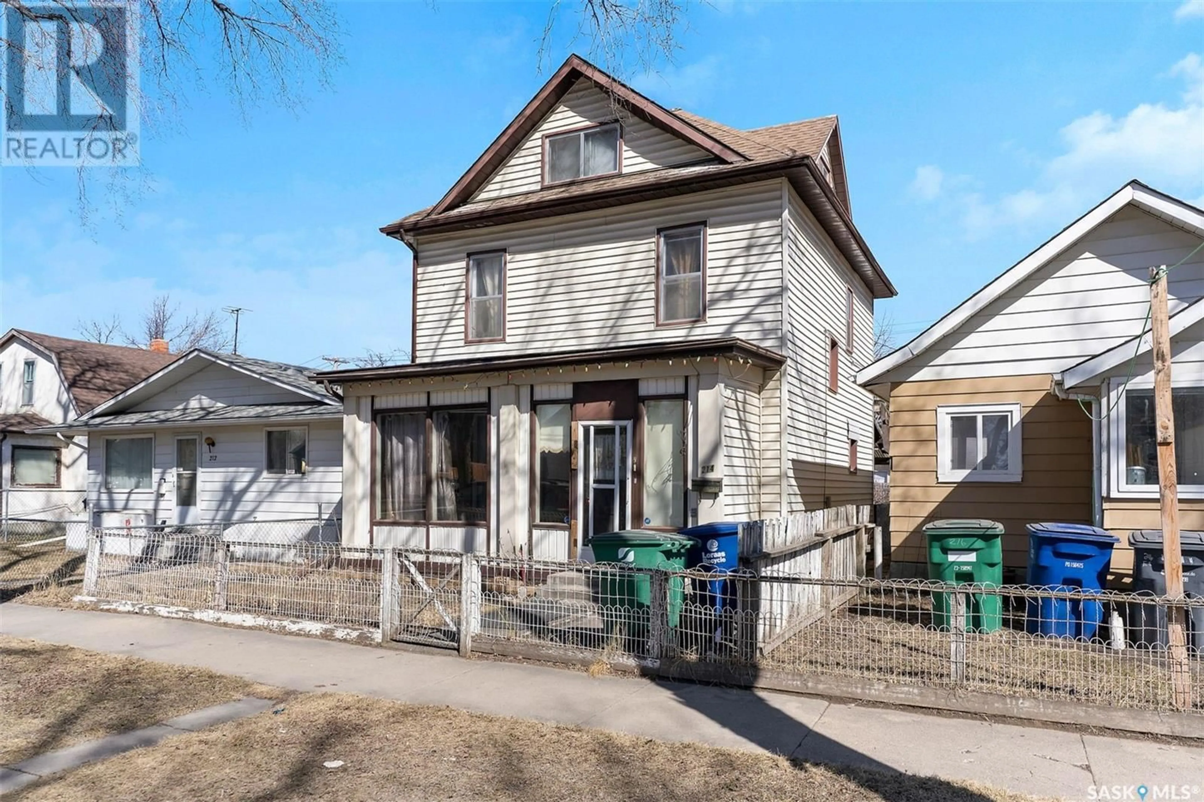 Frontside or backside of a home, the front or back of building for 214 E AVENUE S, Saskatoon Saskatchewan S7M1R9