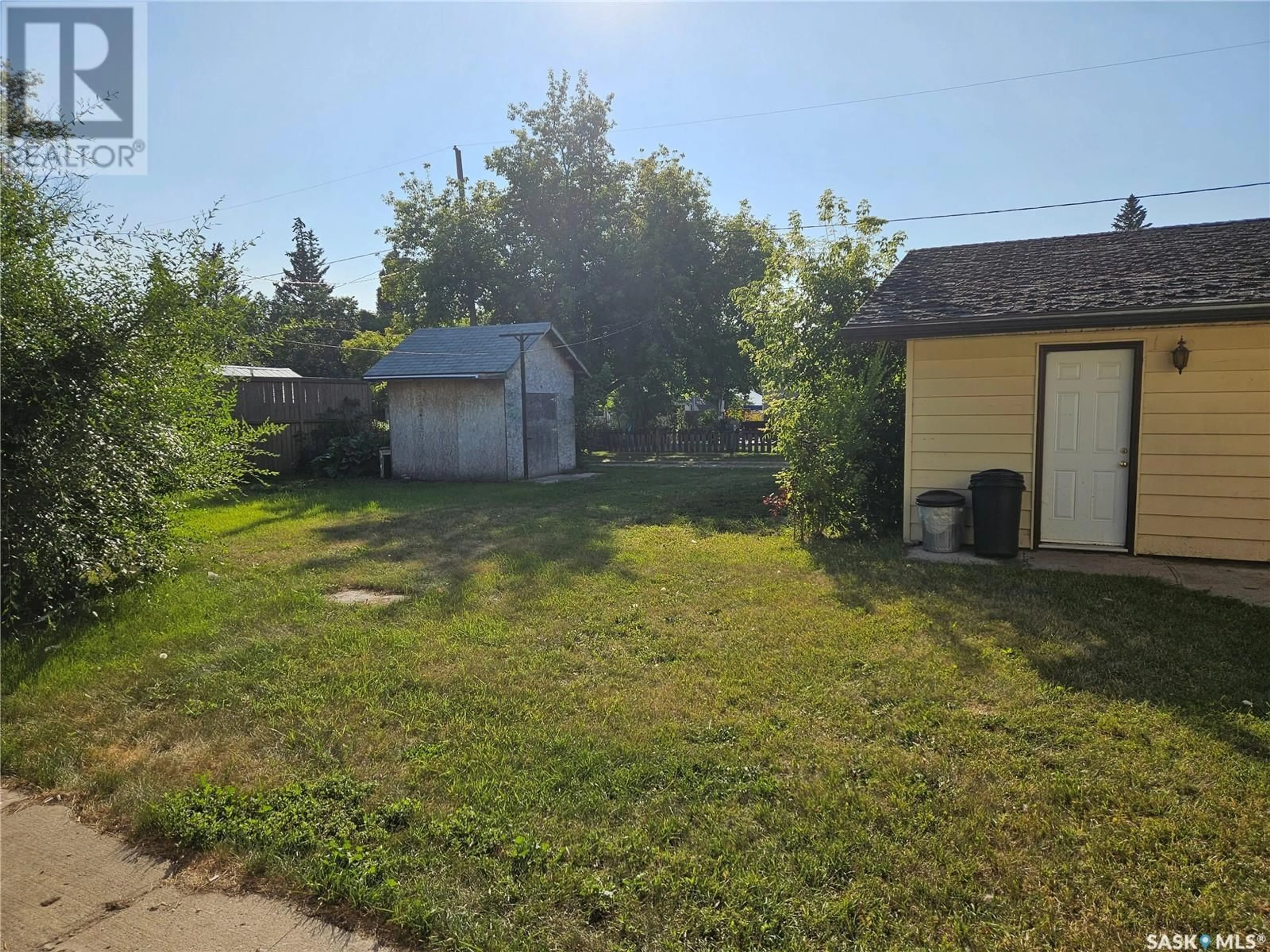 Frontside or backside of a home, the fenced backyard for 203 Main STREET, Lipton Saskatchewan S0G3B0