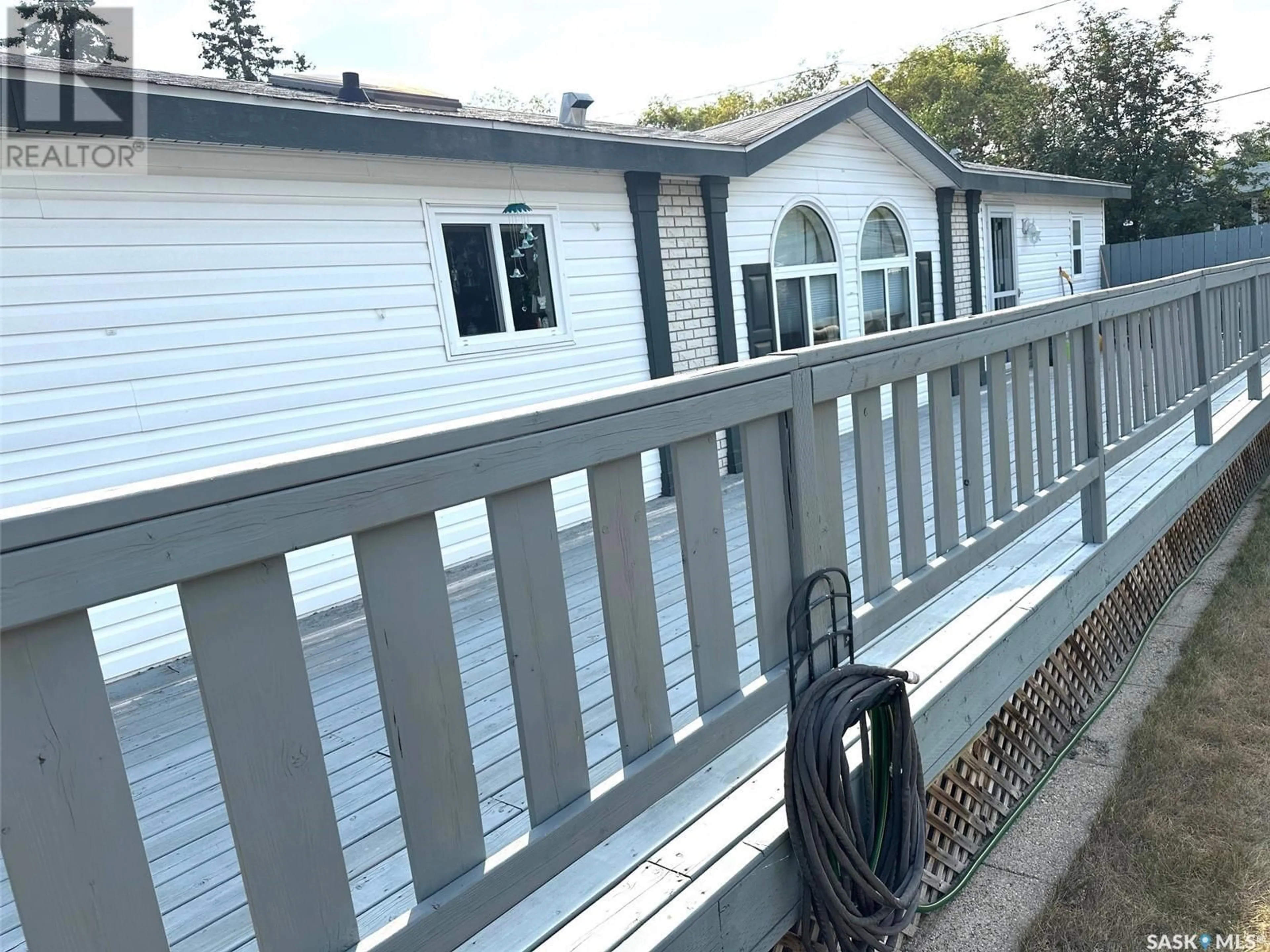 Frontside or backside of a home, the fenced backyard for 40 Hardy CRESCENT, Hudson Bay Saskatchewan S0E0Y0