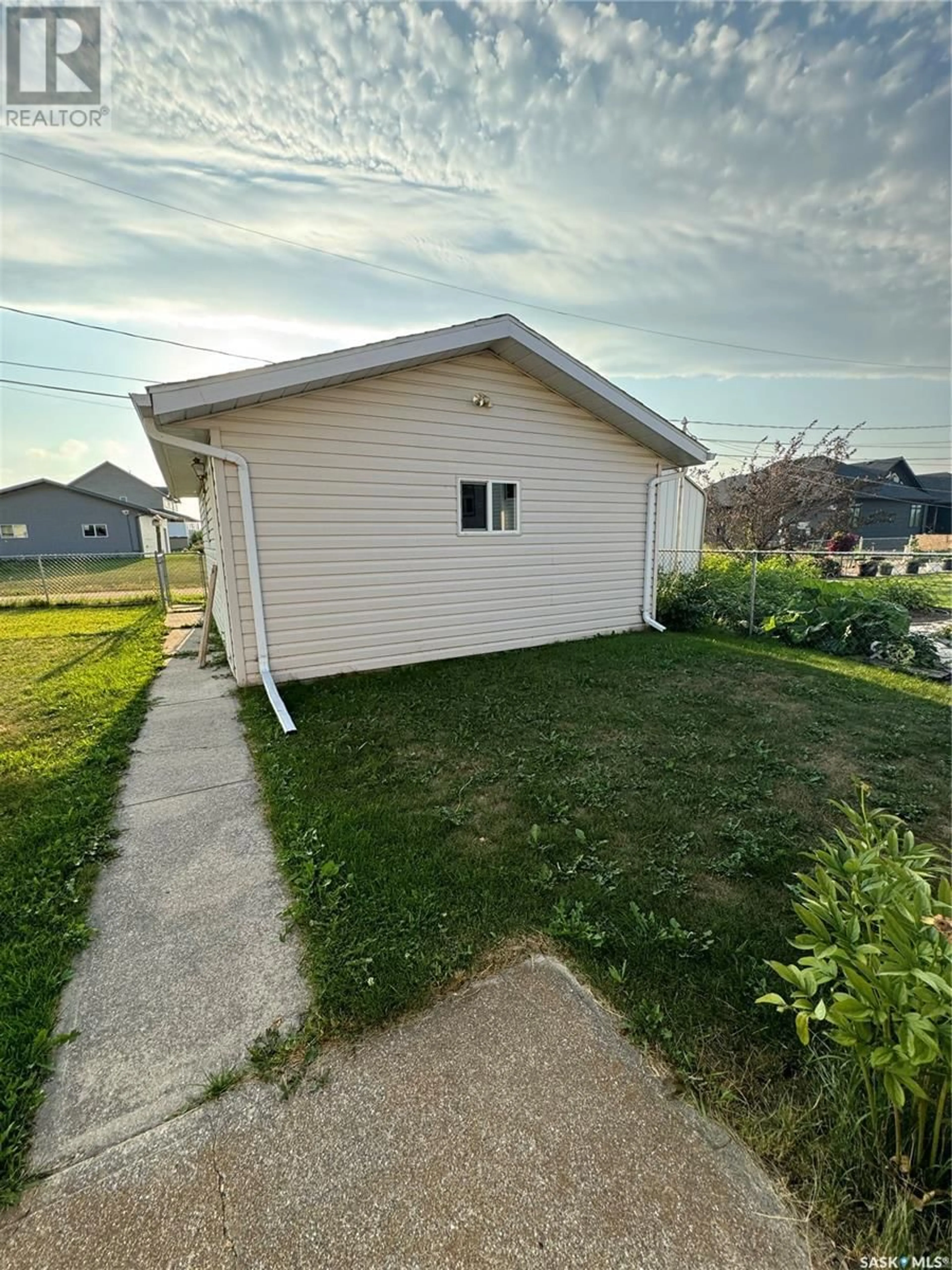 Frontside or backside of a home, the fenced backyard for 532 Simpson CRESCENT, Hudson Bay Saskatchewan S0E0Y0