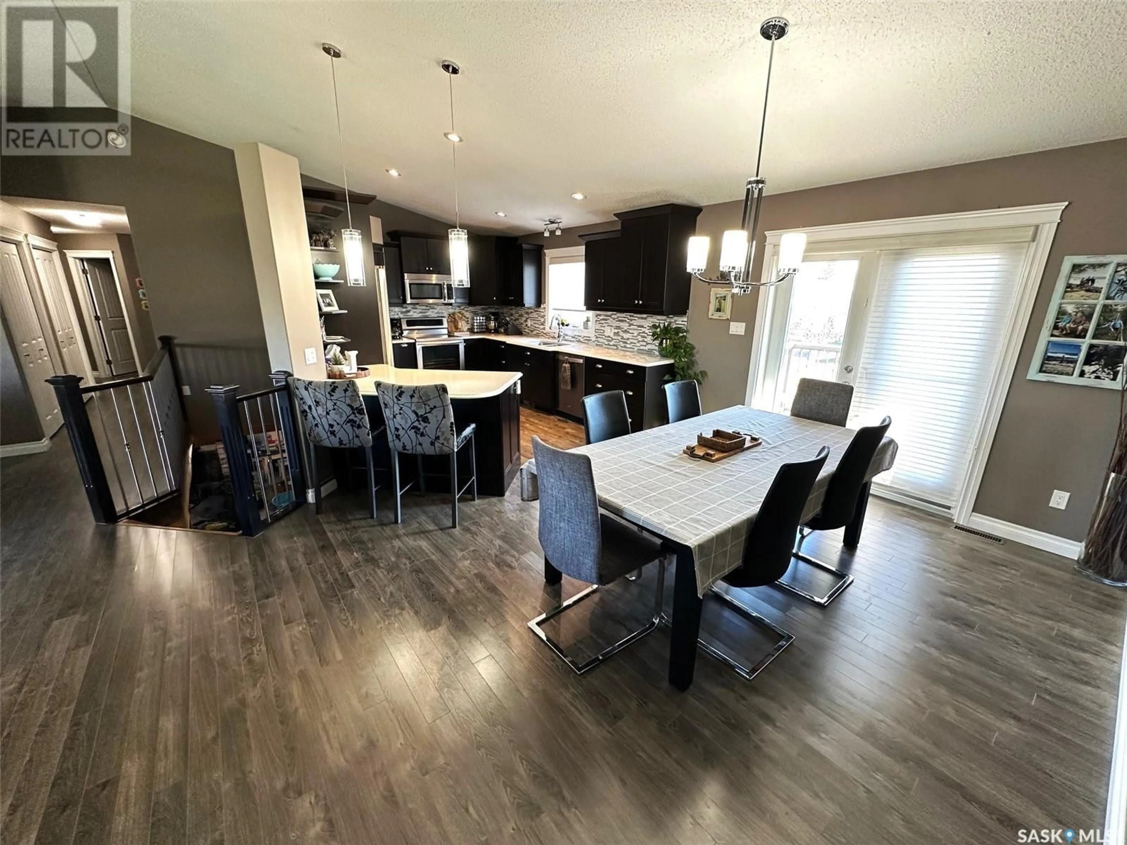 Open concept kitchen, wood/laminate floor for 507 ANDERSON DRIVE, Hudson Bay Saskatchewan S0E0Y0
