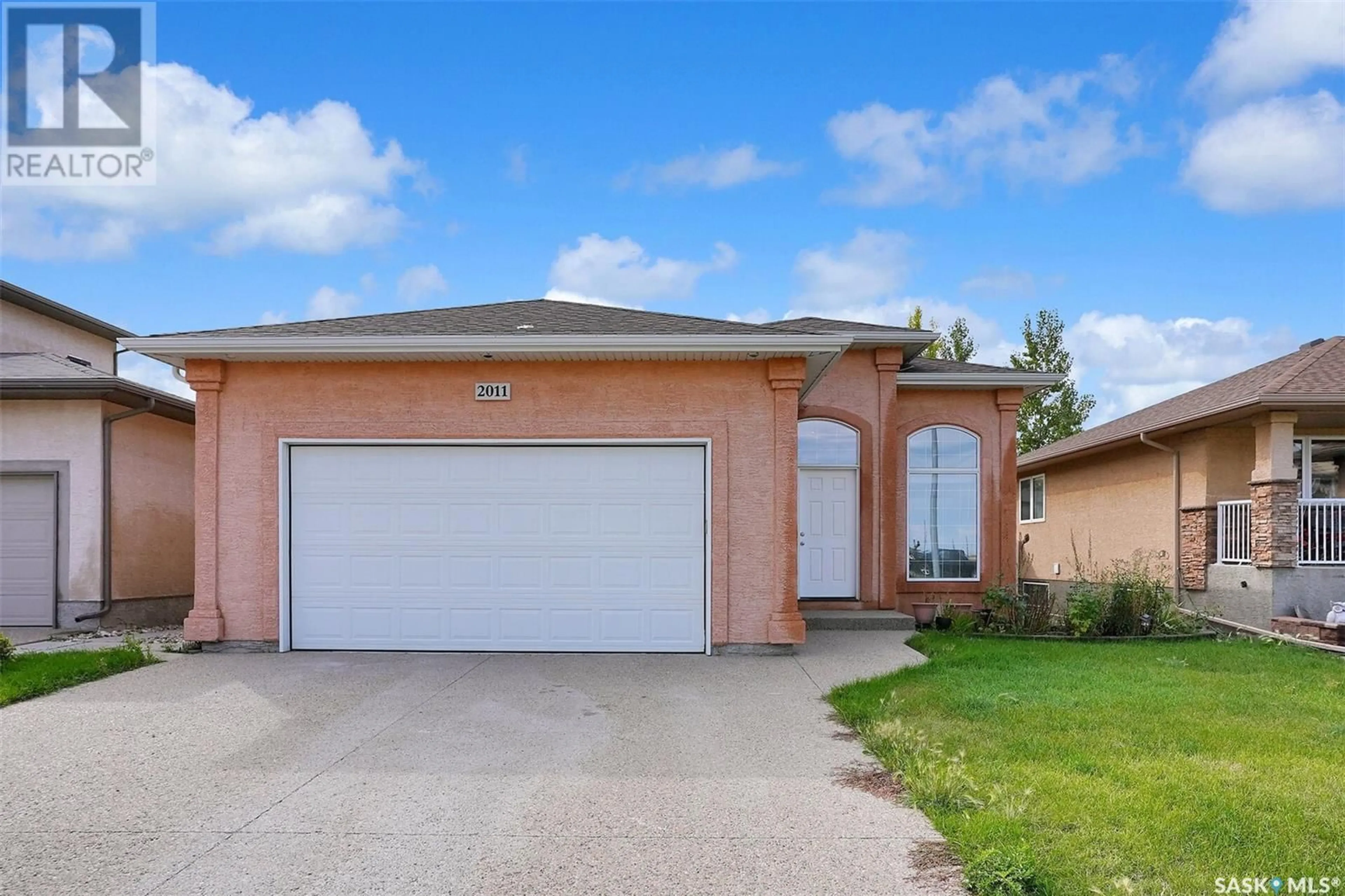 Frontside or backside of a home for 2011 NORMAN MACKENZIE ROAD, Regina Saskatchewan S4X0A6