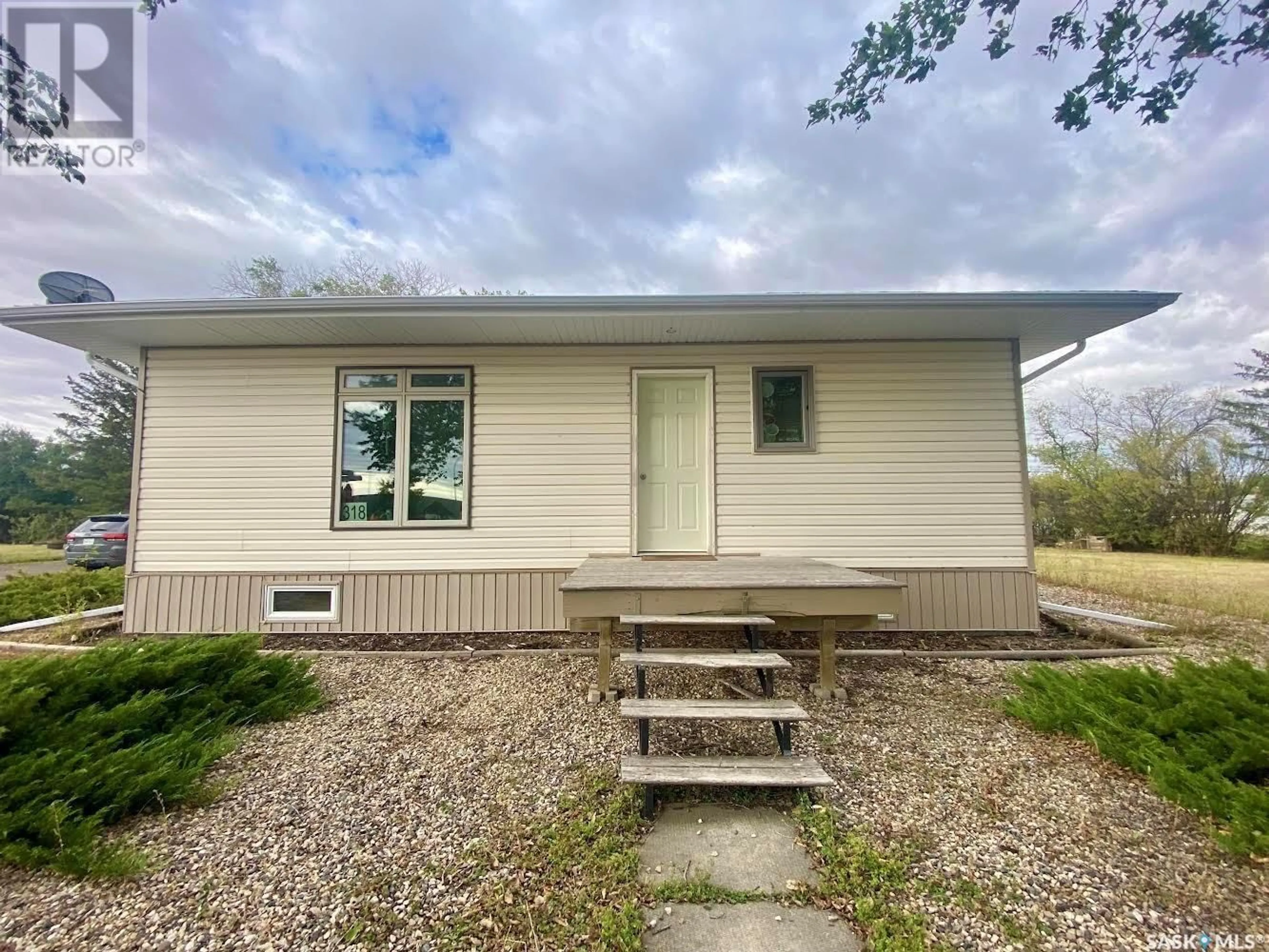 Frontside or backside of a home, the front or back of building for 318 Centre STREET, Kyle Saskatchewan S0L1T0