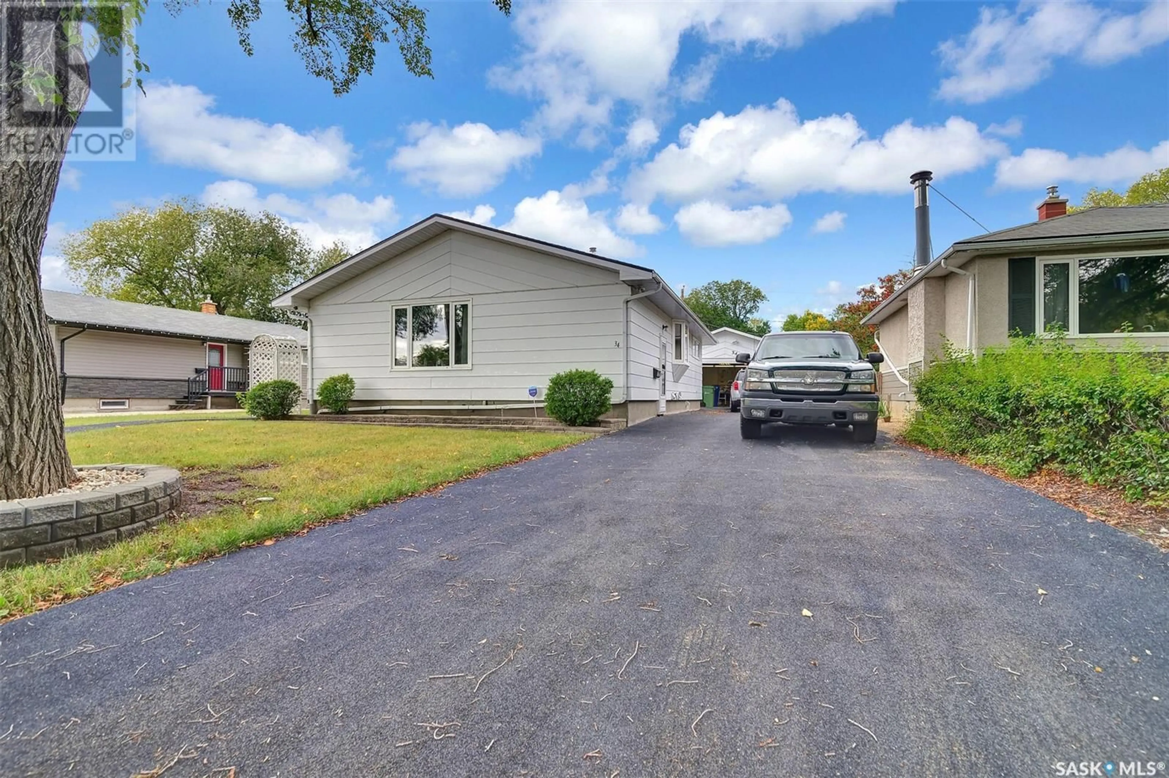 Frontside or backside of a home for 34 LAIRD CRESCENT, Regina Saskatchewan S4R4N8