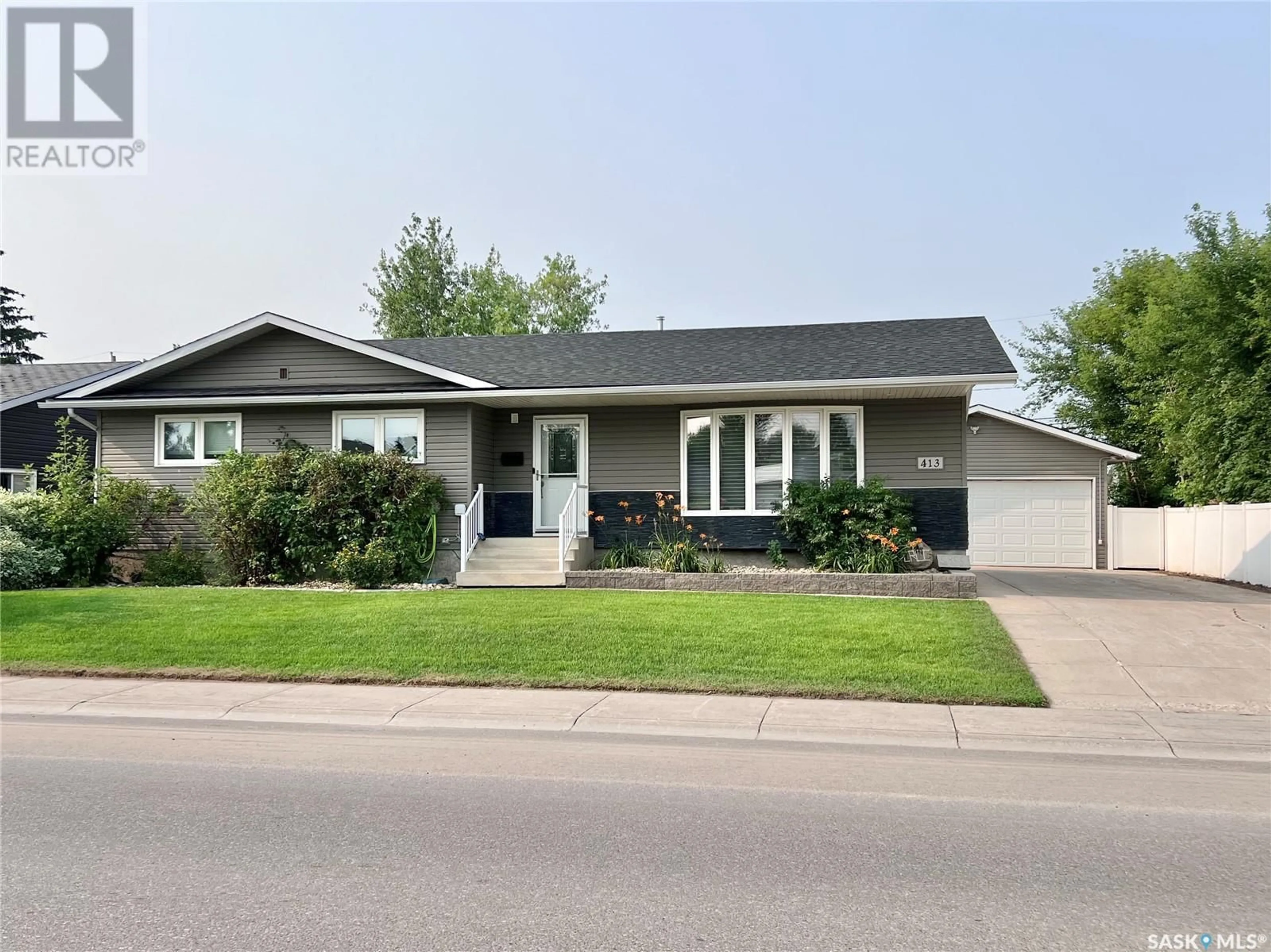 Frontside or backside of a home for 413 3rd STREET N, Martensville Saskatchewan S0K2T2