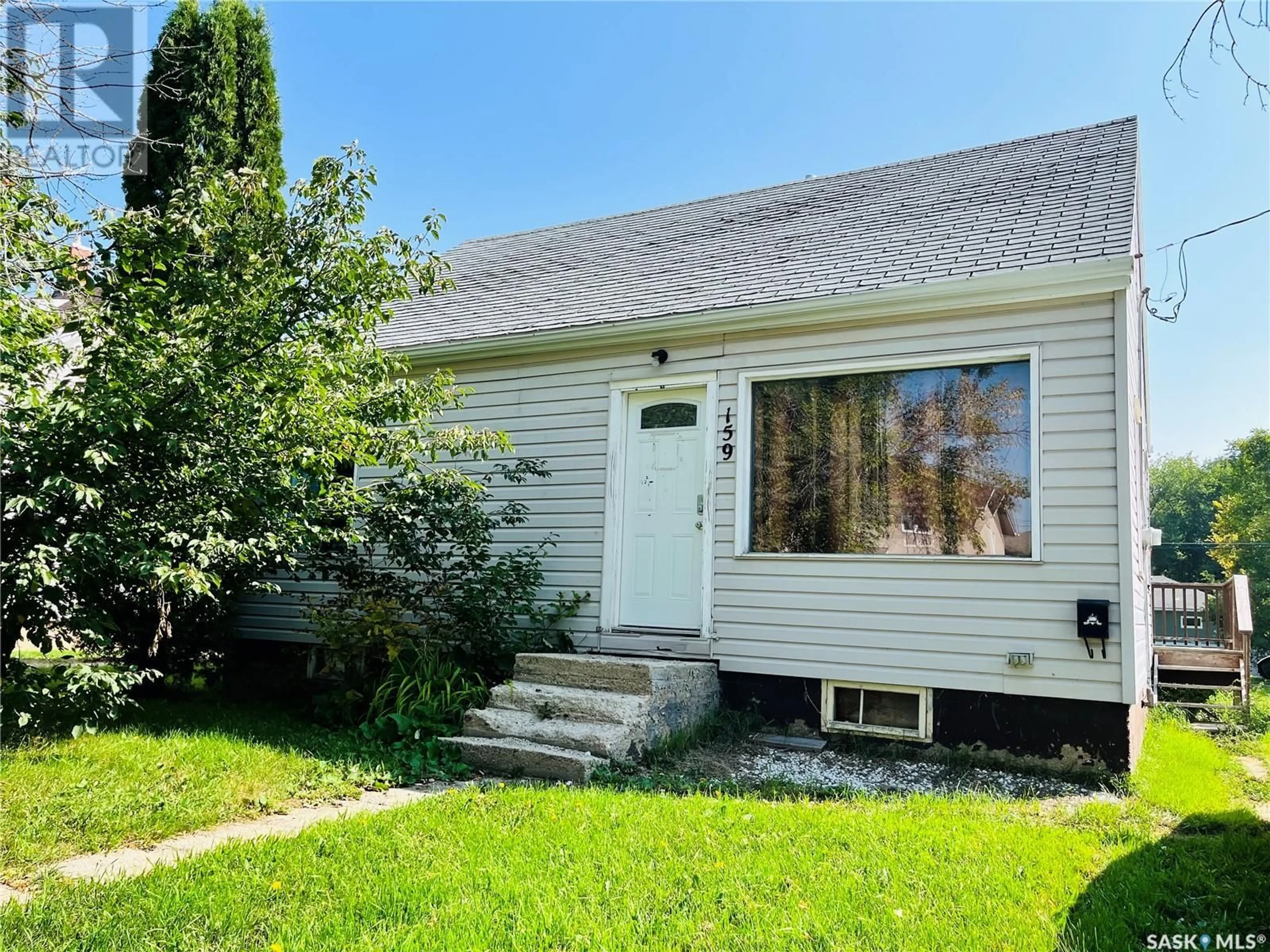 Home with vinyl exterior material, street for 159 WELLINGTON AVENUE, Yorkton Saskatchewan S3N1Y4