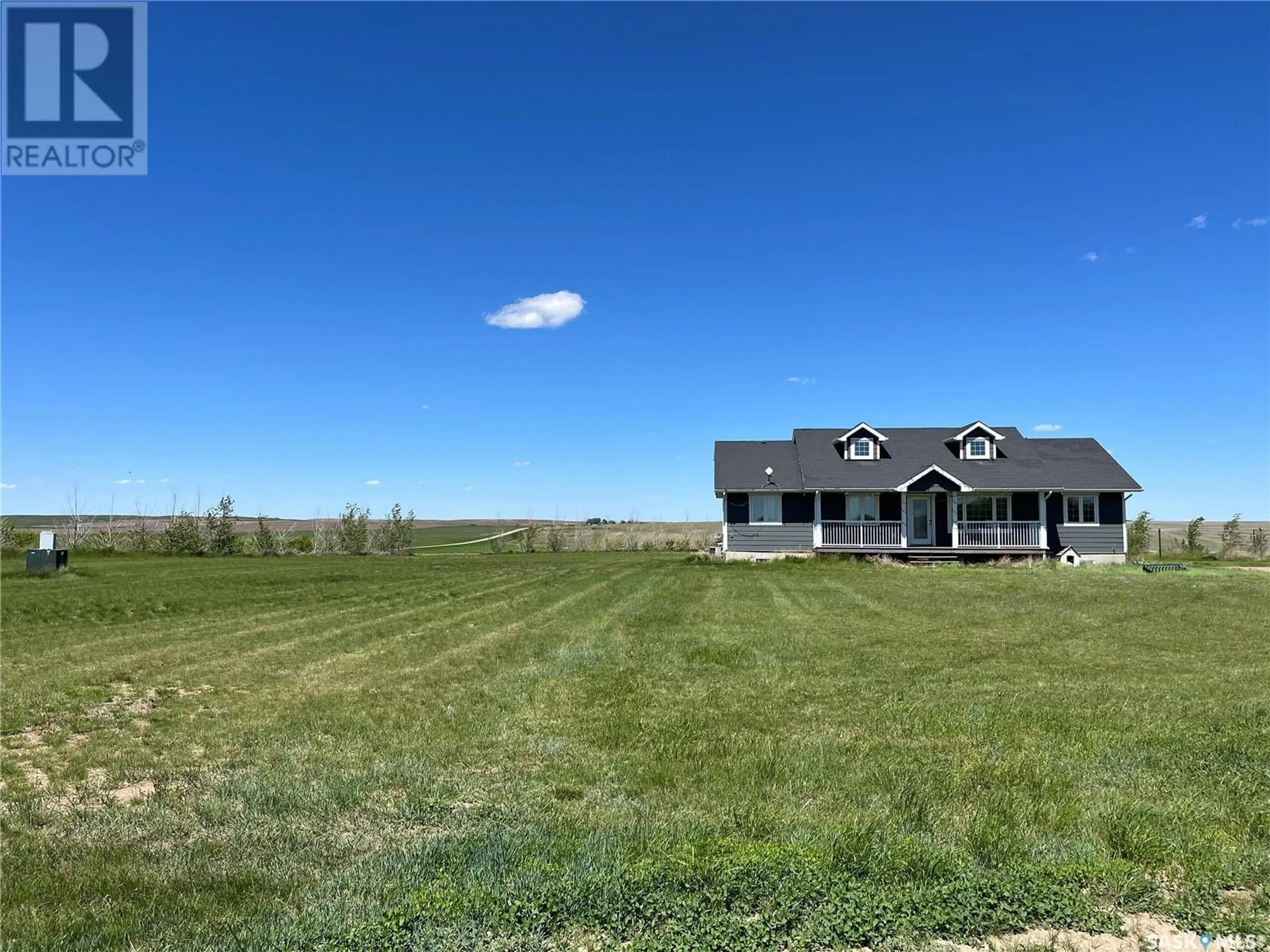 Frontside or backside of a home, the fenced backyard for Graham Acreage, Riverside Rm No. 168 Saskatchewan S0N0C1