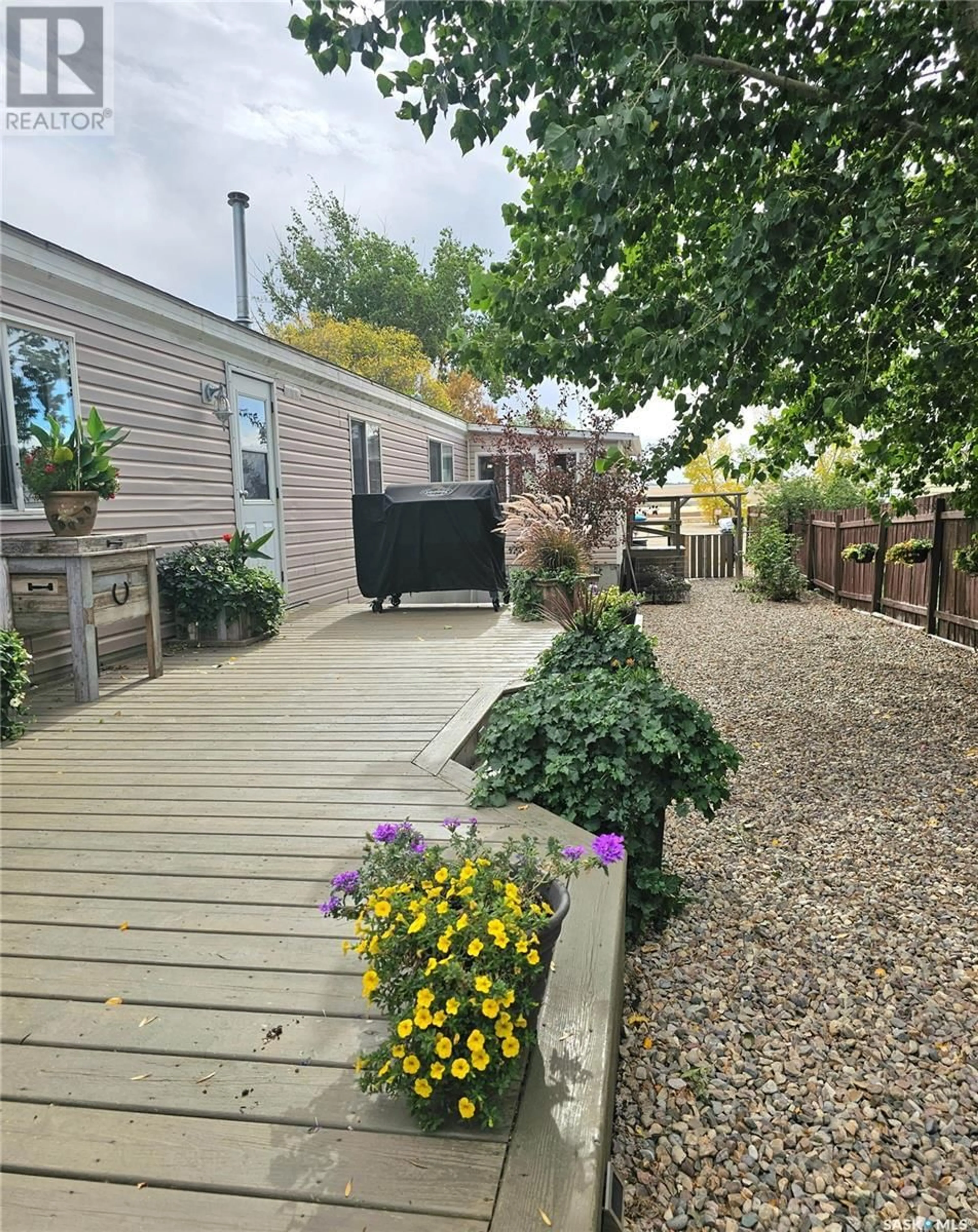 Patio, the fenced backyard for 30 Prairie Sun COURT, Swift Current Saskatchewan S9H3X6