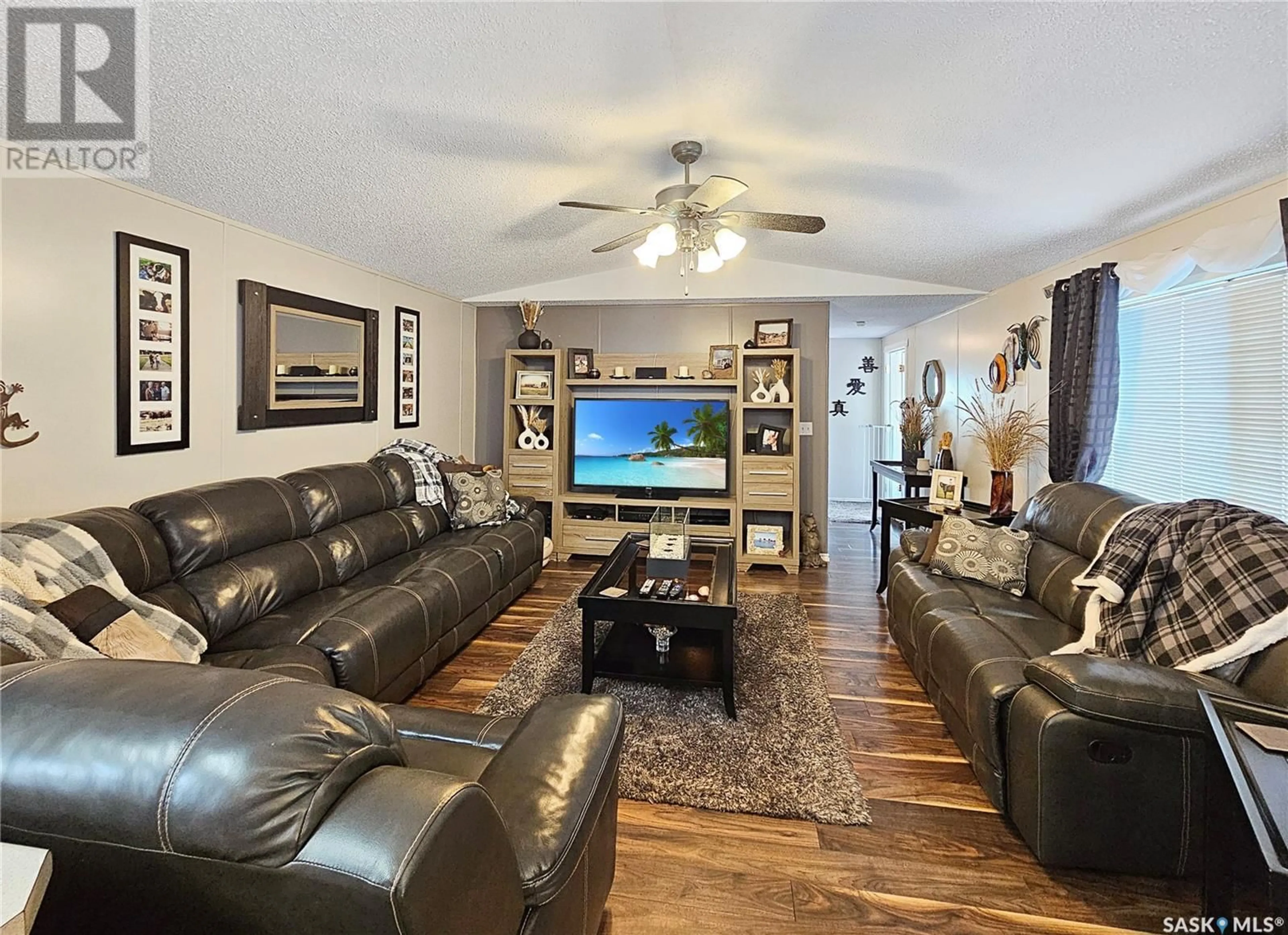 Living room, wood floors for 30 Prairie Sun COURT, Swift Current Saskatchewan S9H3X6