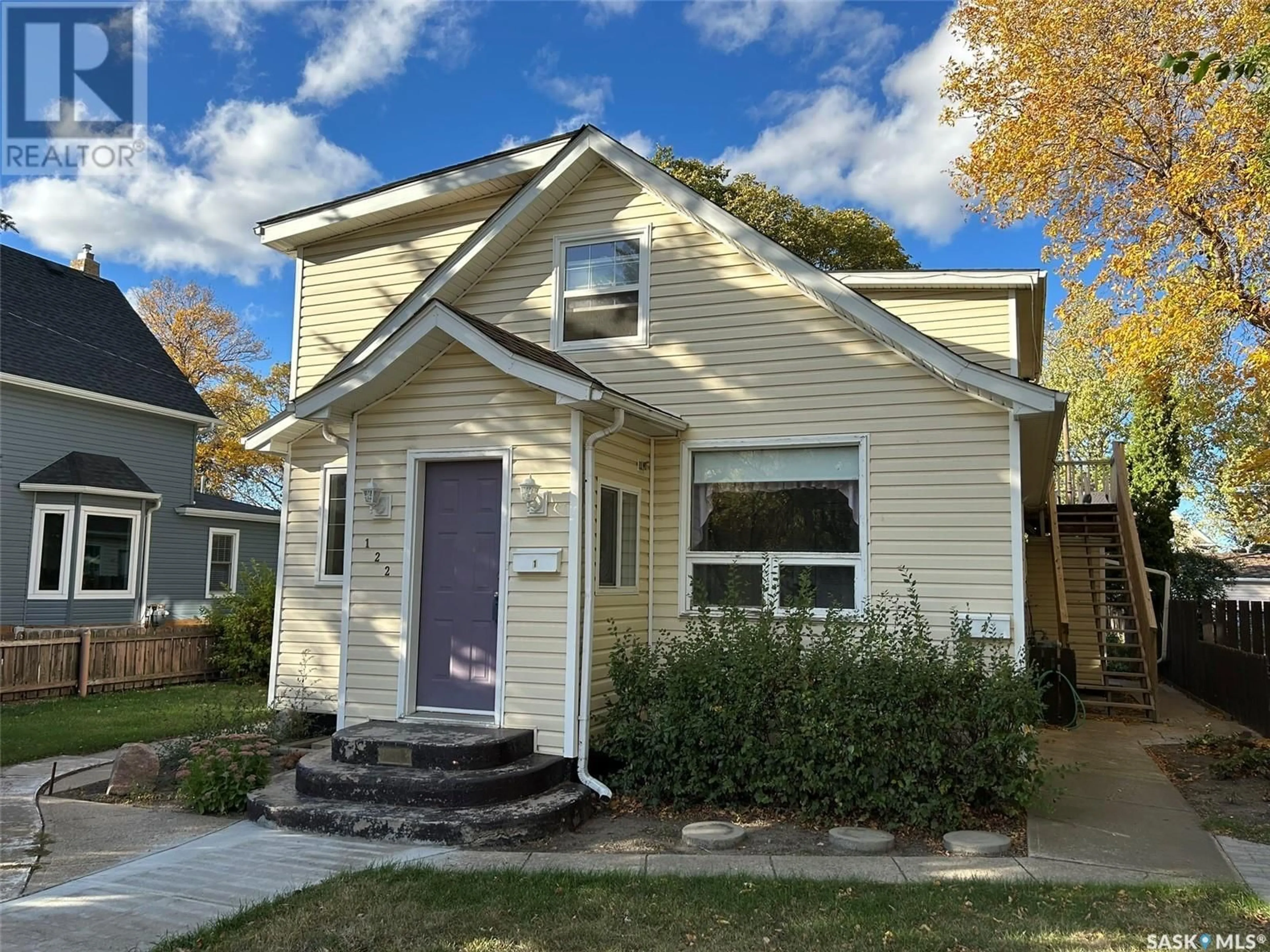 Frontside or backside of a home, cottage for 122 Lillooet STREET E, Moose Jaw Saskatchewan S6H4S5