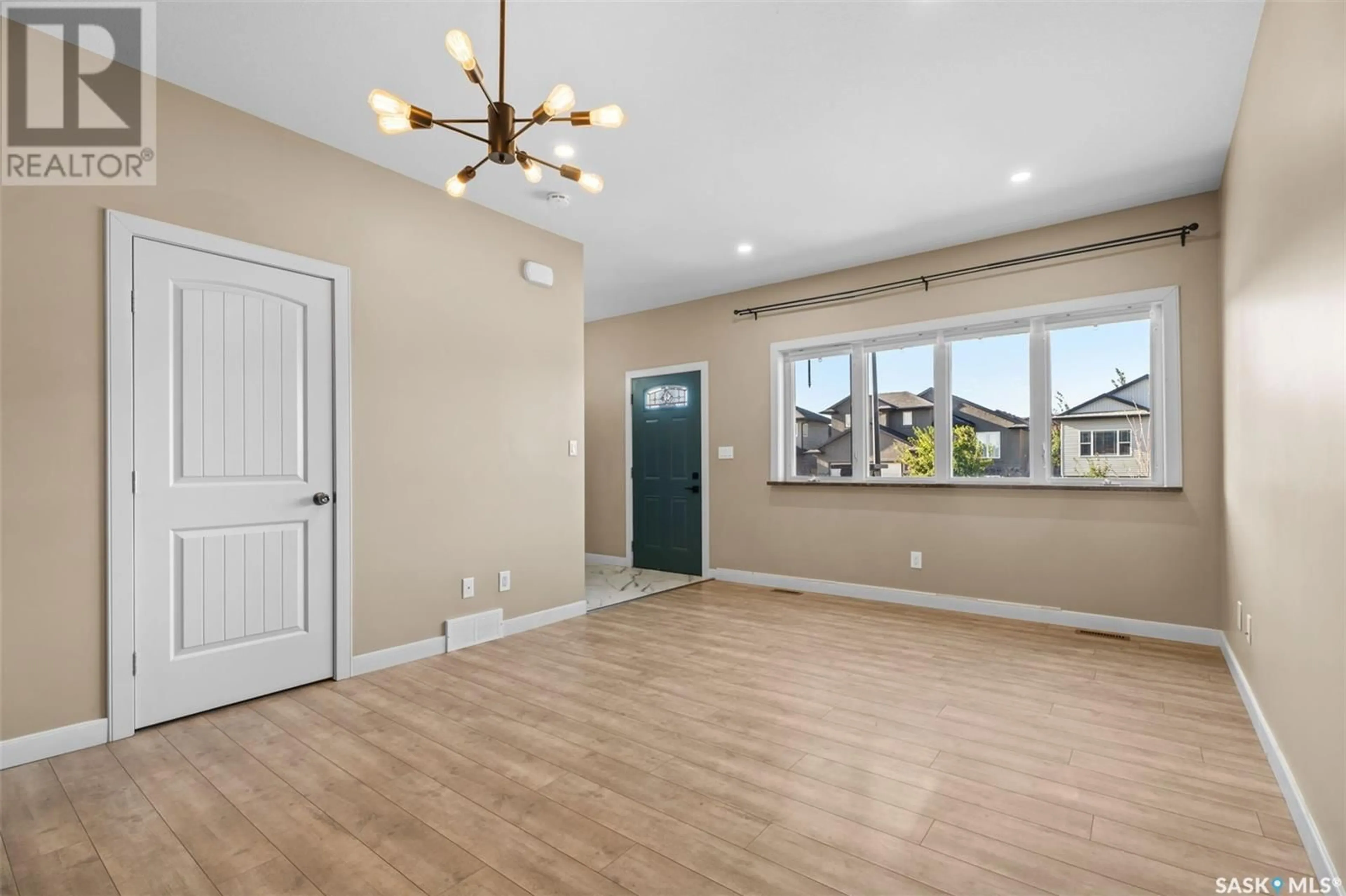 A pic of a room, wood floors for 14 1703 Patrick CRESCENT, Saskatoon Saskatchewan S7W0L6