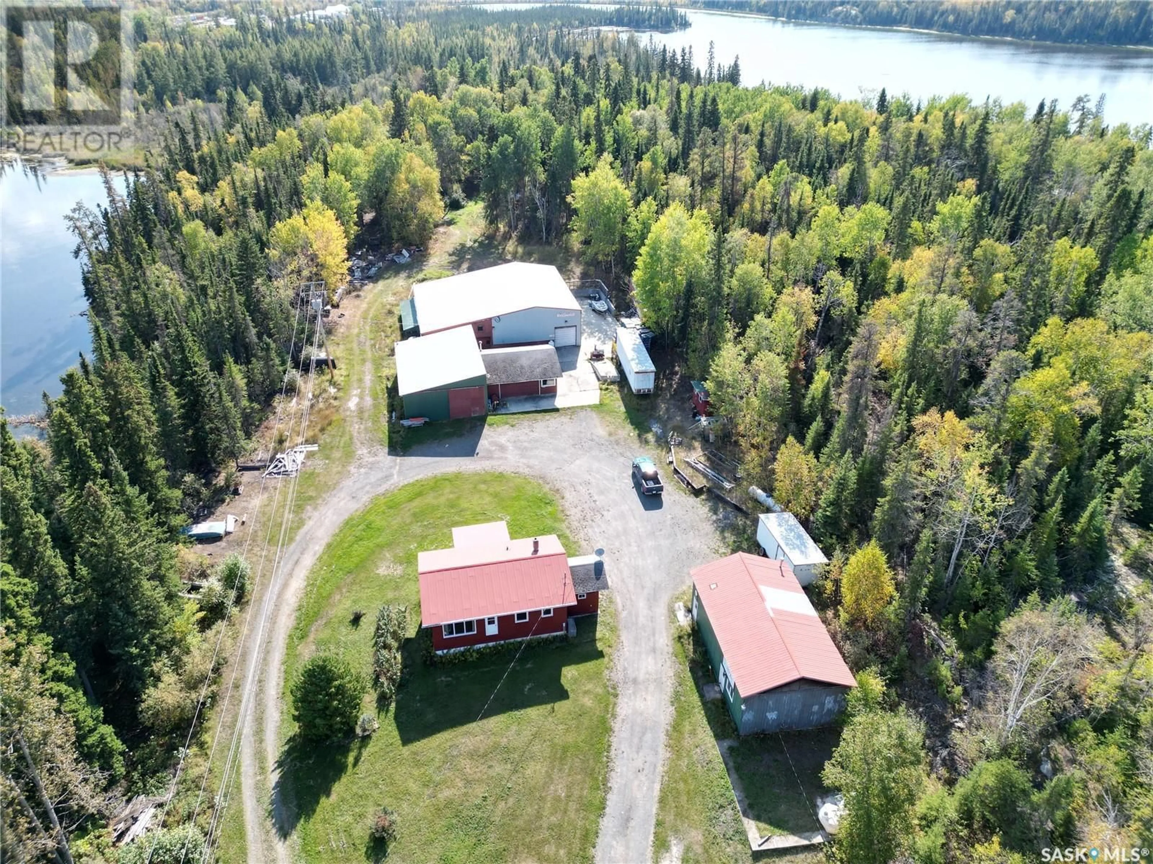 A pic from outside/outdoor area/front of a property/back of a property/a pic from drone, unknown for 915 MOSHER ROAD, Denare Beach Saskatchewan S0P0B0