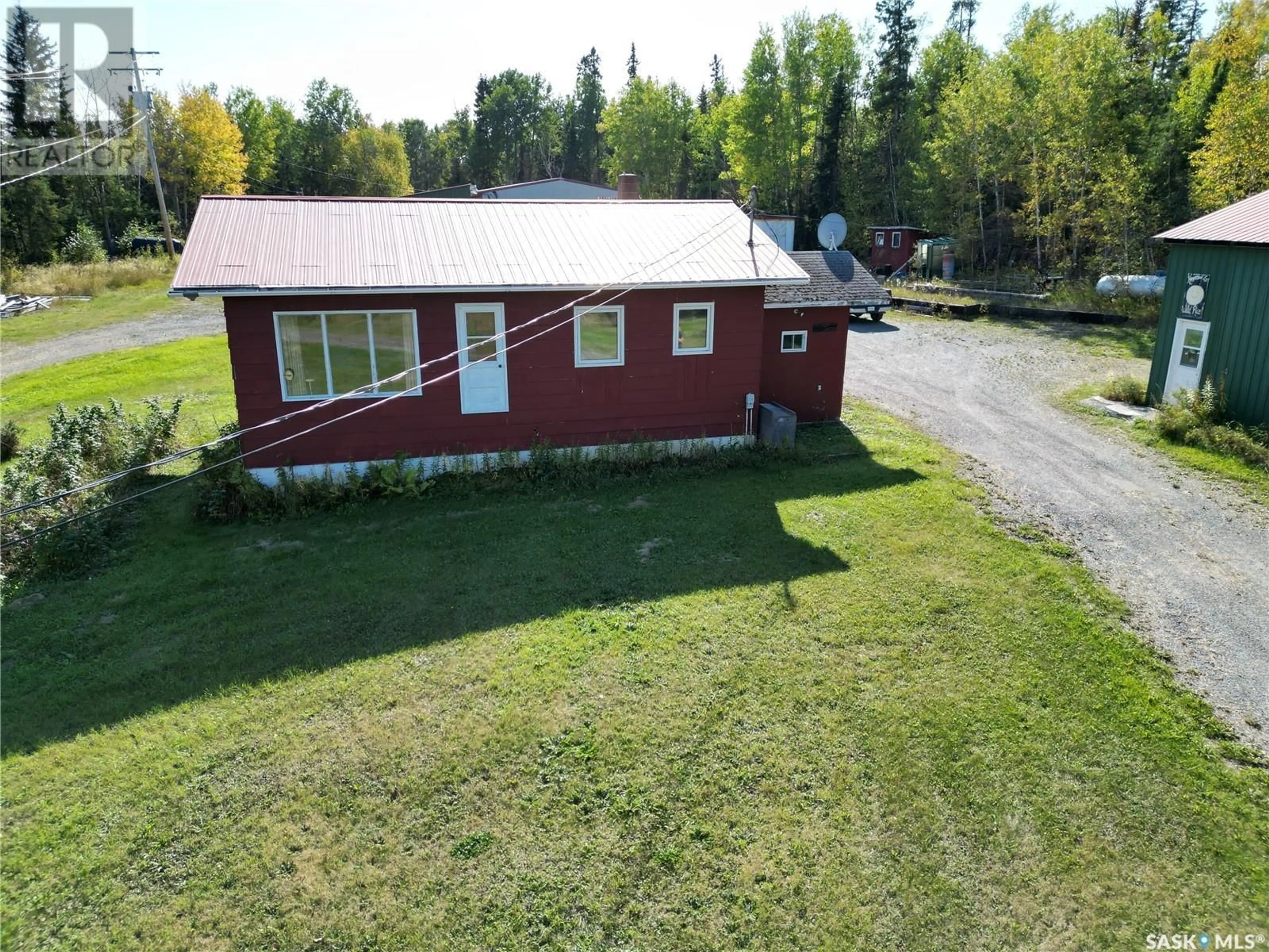 A pic from outside/outdoor area/front of a property/back of a property/a pic from drone, building for 915 MOSHER ROAD, Denare Beach Saskatchewan S0P0B0