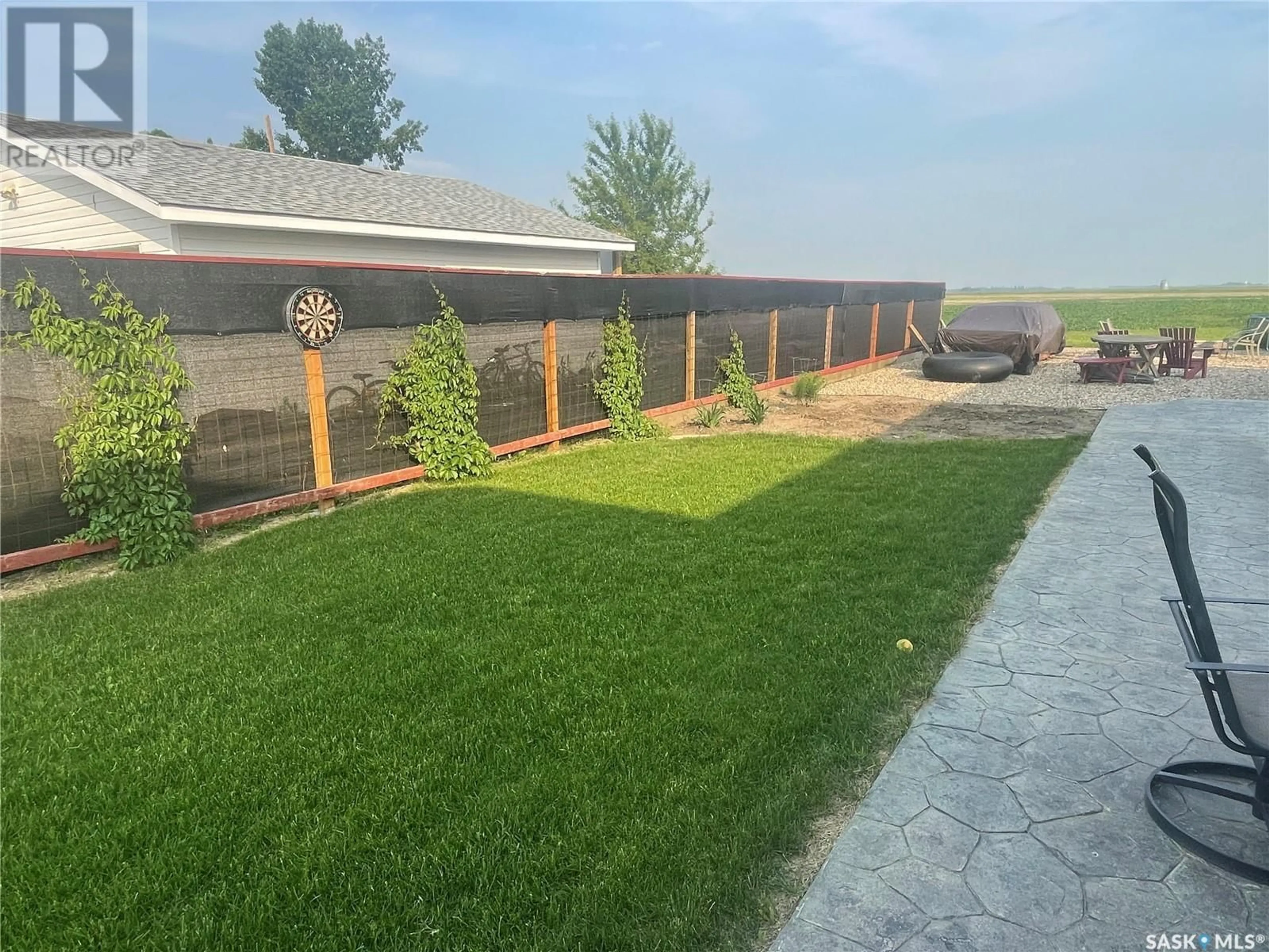 Patio, the fenced backyard for 180 2nd STREET, Meota Saskatchewan S0M1X0