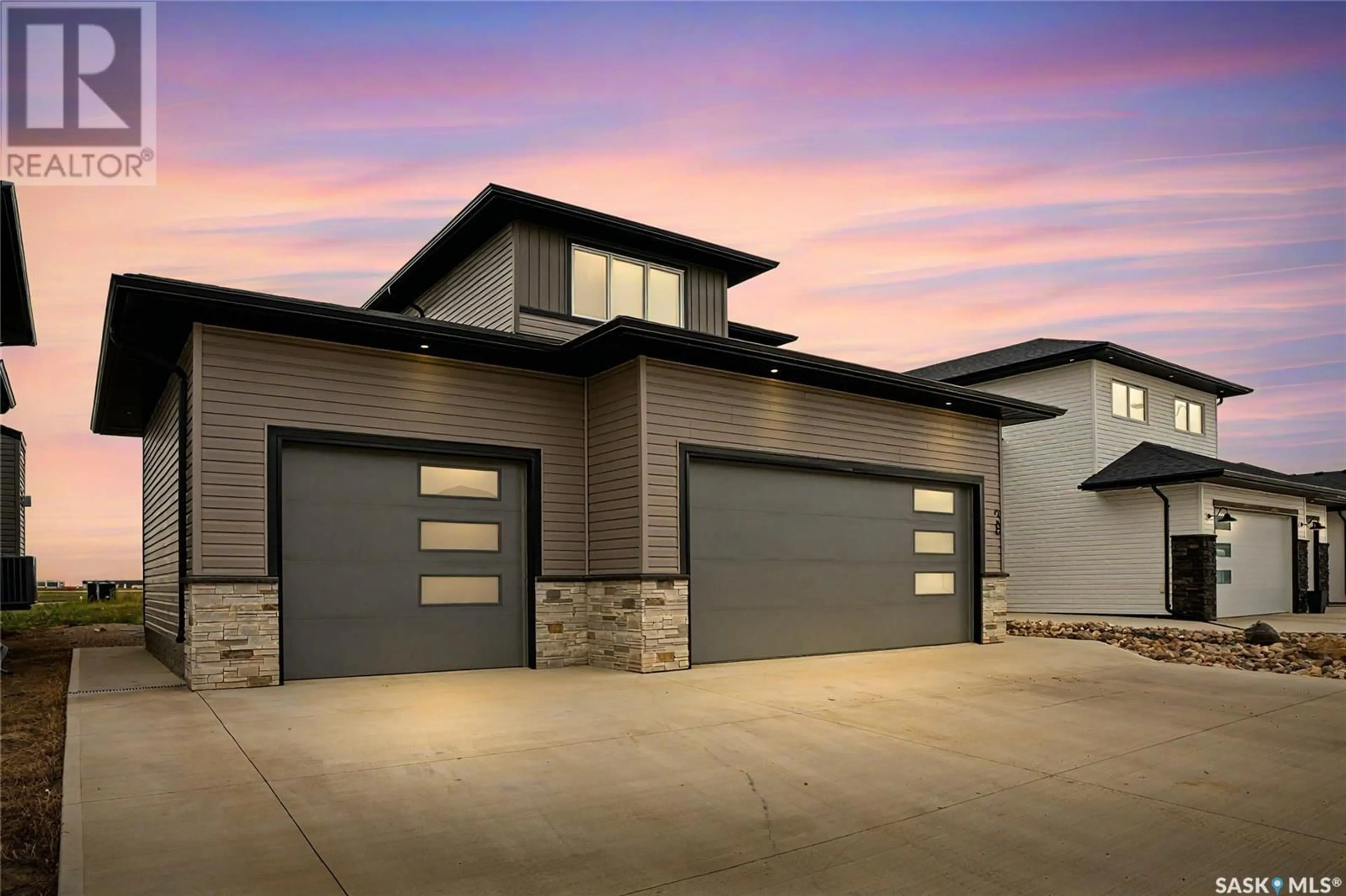 Frontside or backside of a home for 38 Clunie COURT, Moose Jaw Saskatchewan S6J0E3