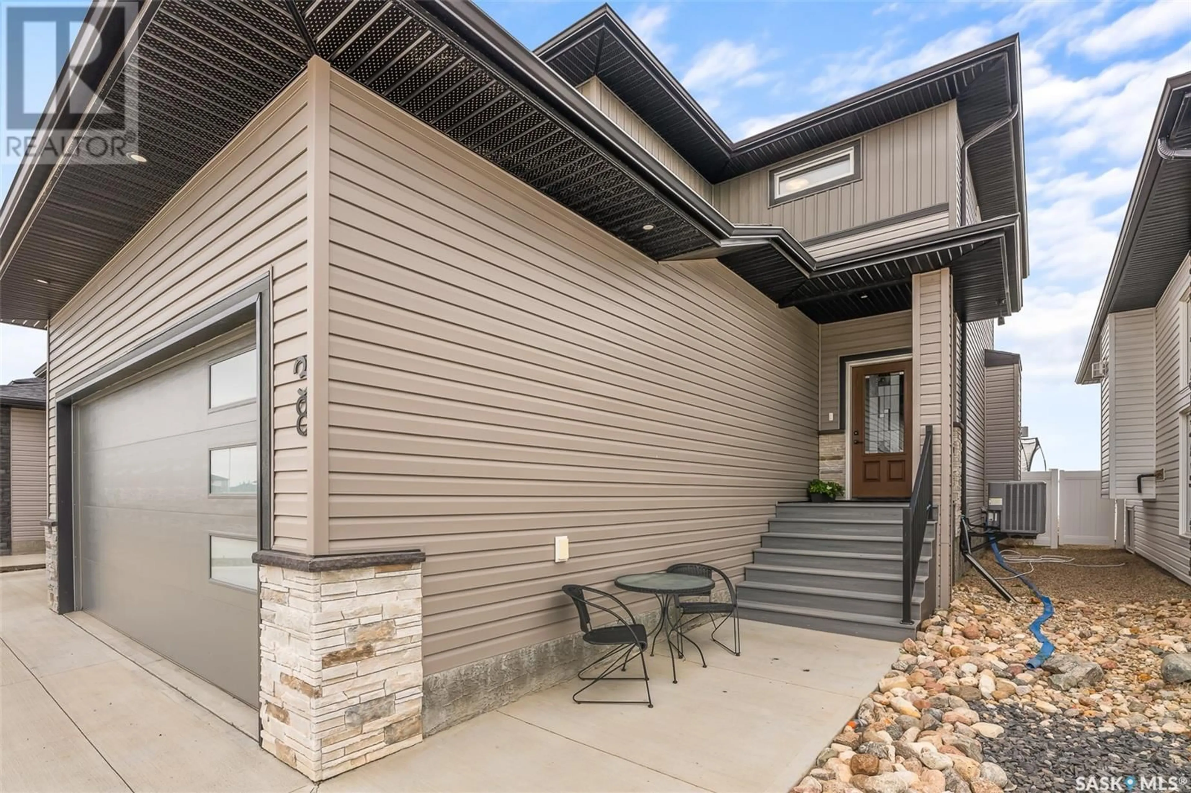 Home with vinyl exterior material, street for 38 Clunie COURT, Moose Jaw Saskatchewan S6J0E3