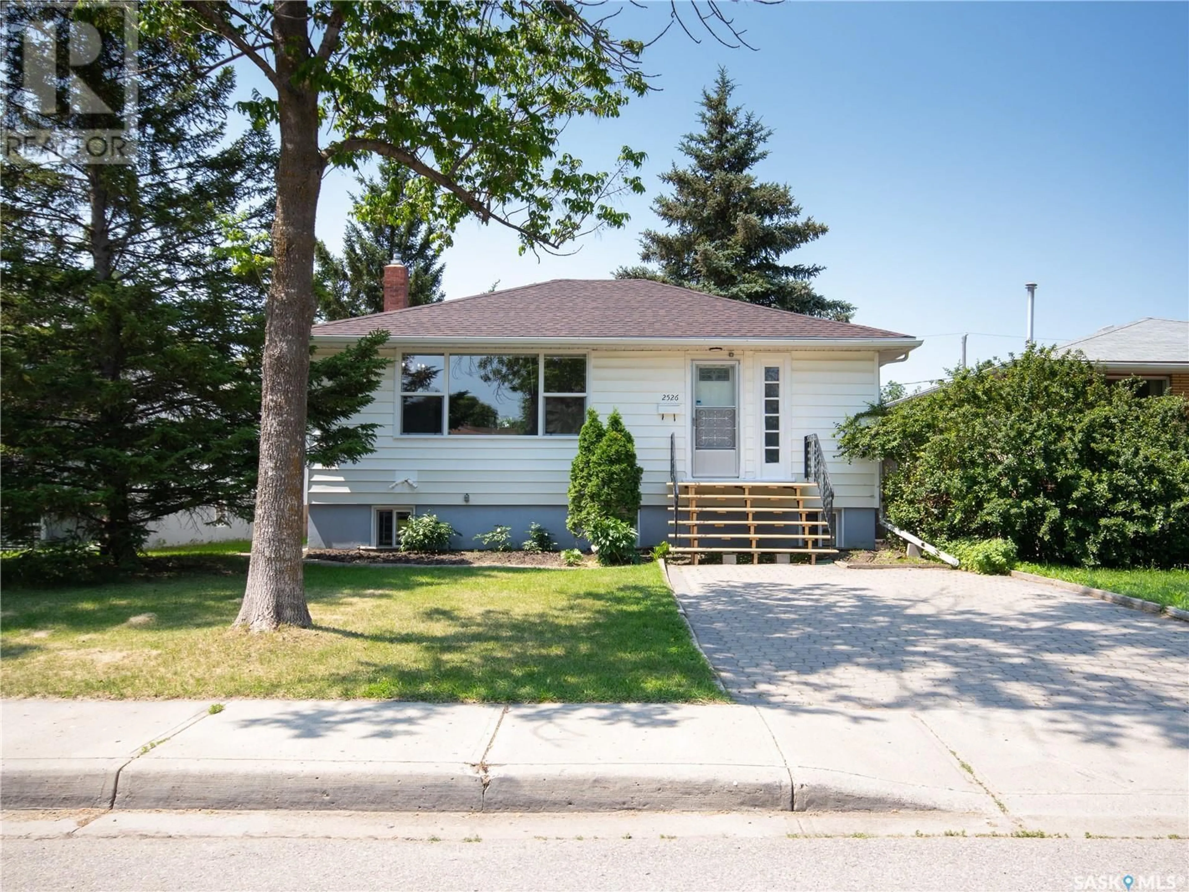 Home with vinyl exterior material, street for 2526 Lindsay STREET, Regina Saskatchewan S4N3C9