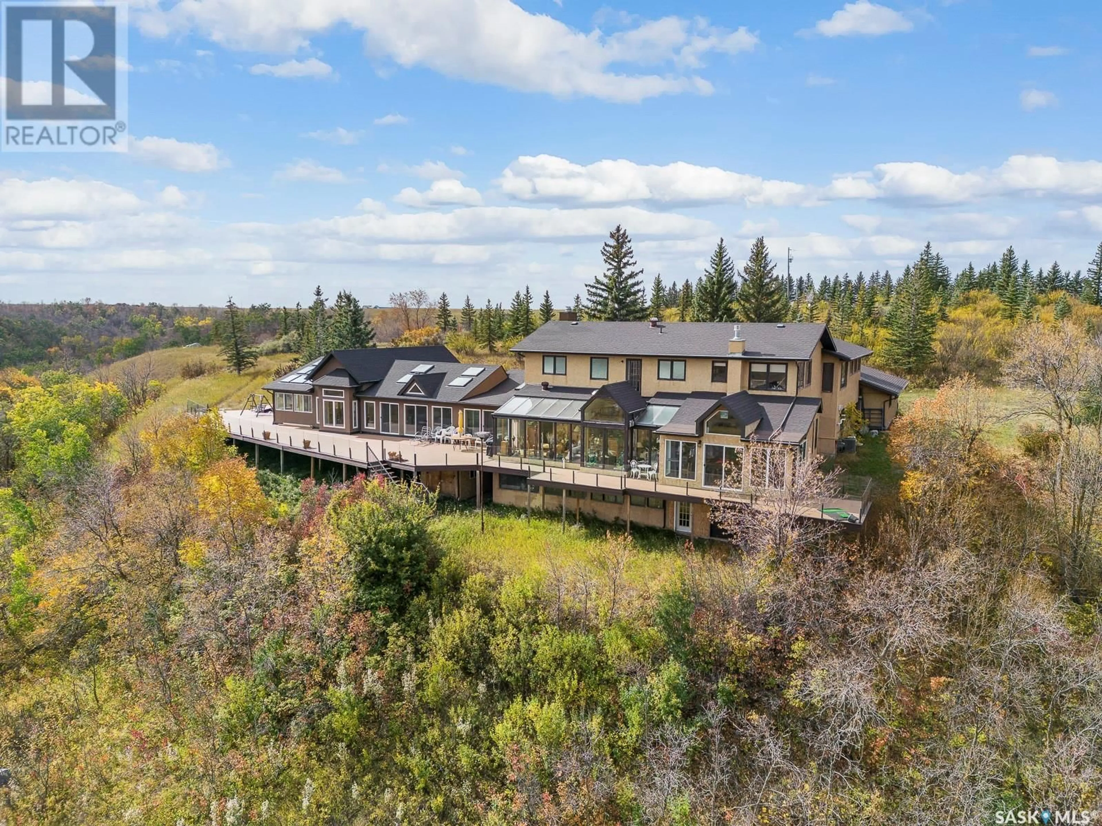 A pic from outside/outdoor area/front of a property/back of a property/a pic from drone, water/lake/river/ocean view for RIPPLINGER ACREAGE, Lumsden Rm No. 189 Saskatchewan S0G0W0