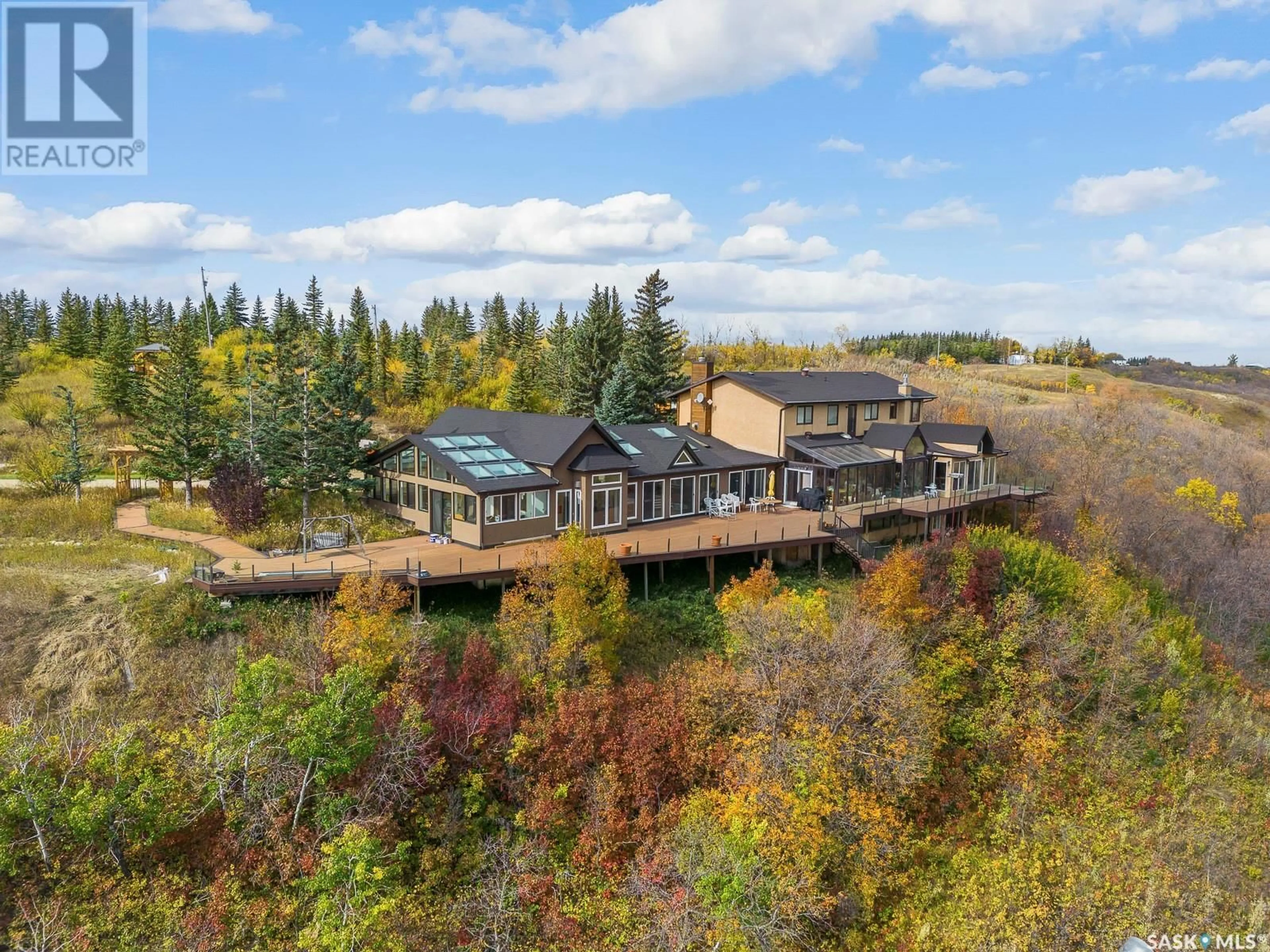 A pic from outside/outdoor area/front of a property/back of a property/a pic from drone, water/lake/river/ocean view for RIPPLINGER ACREAGE, Lumsden Rm No. 189 Saskatchewan S0G0W0