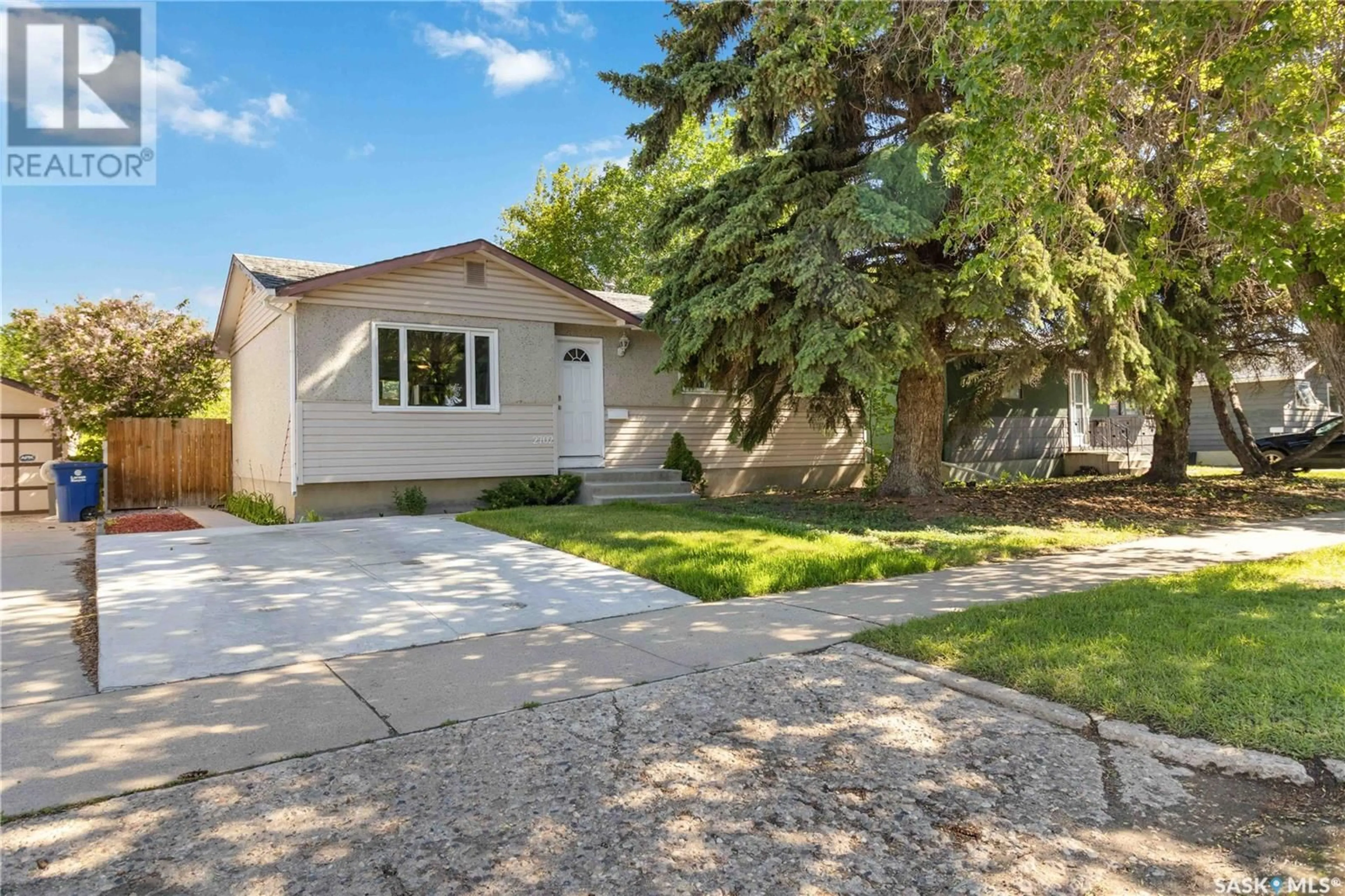 A pic from exterior of the house or condo, the fenced backyard for 2702 33rd STREET W, Saskatoon Saskatchewan S7L0X7