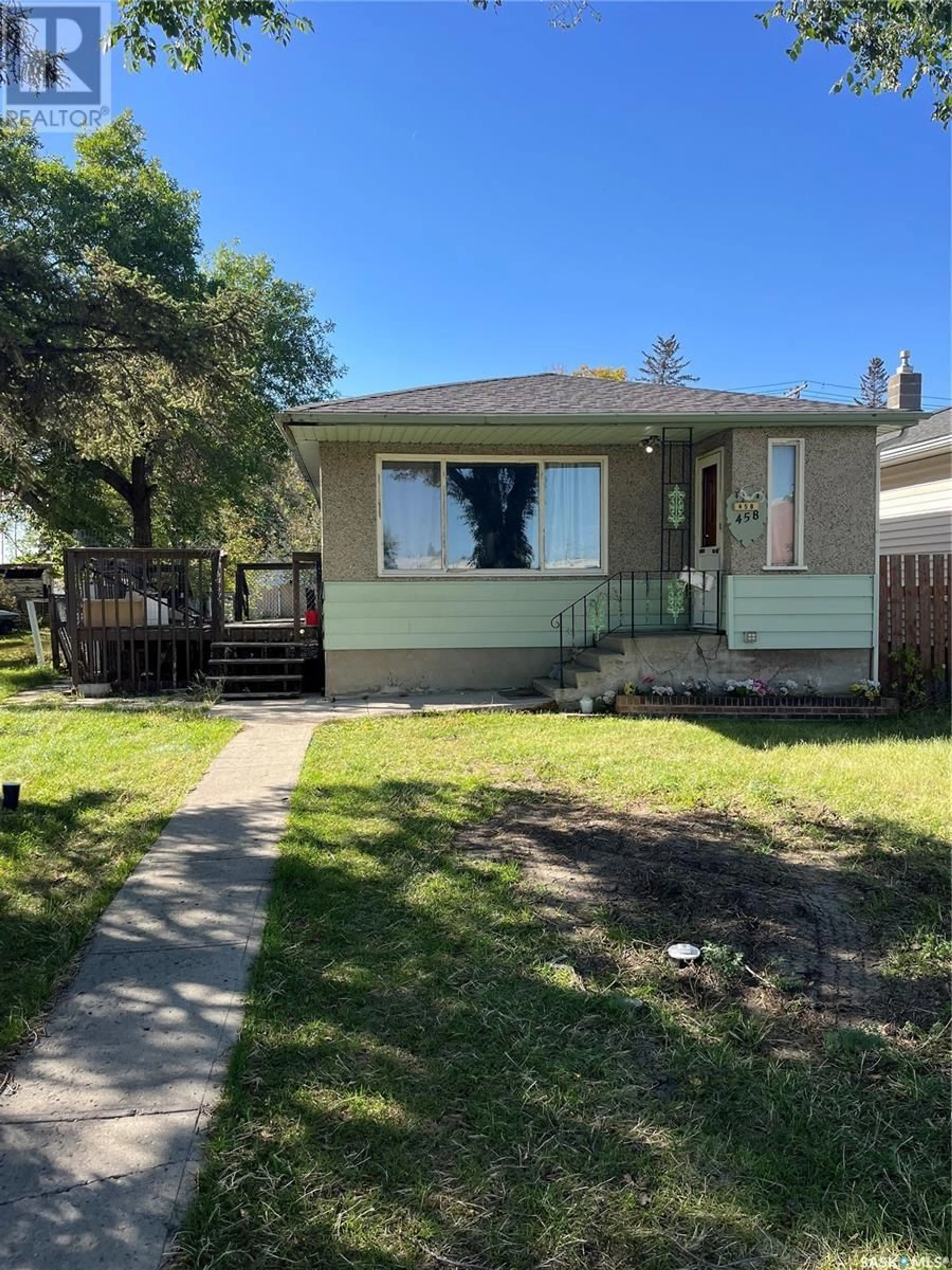 Frontside or backside of a home, the fenced backyard for 458 Hamilton STREET, Regina Saskatchewan S4R2A7