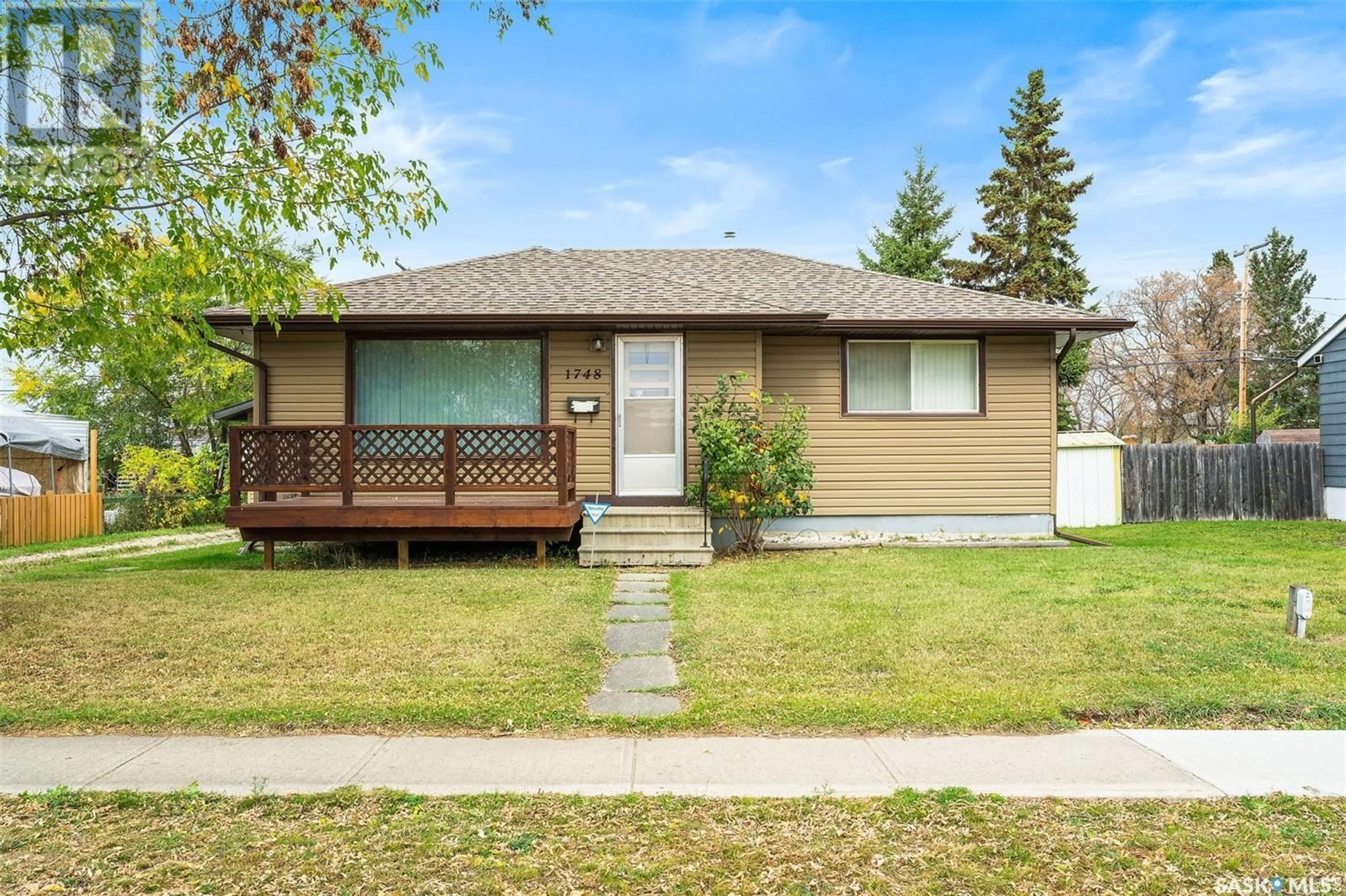 Frontside or backside of a home for 1748 15th STREET W, Prince Albert Saskatchewan S6V3T5