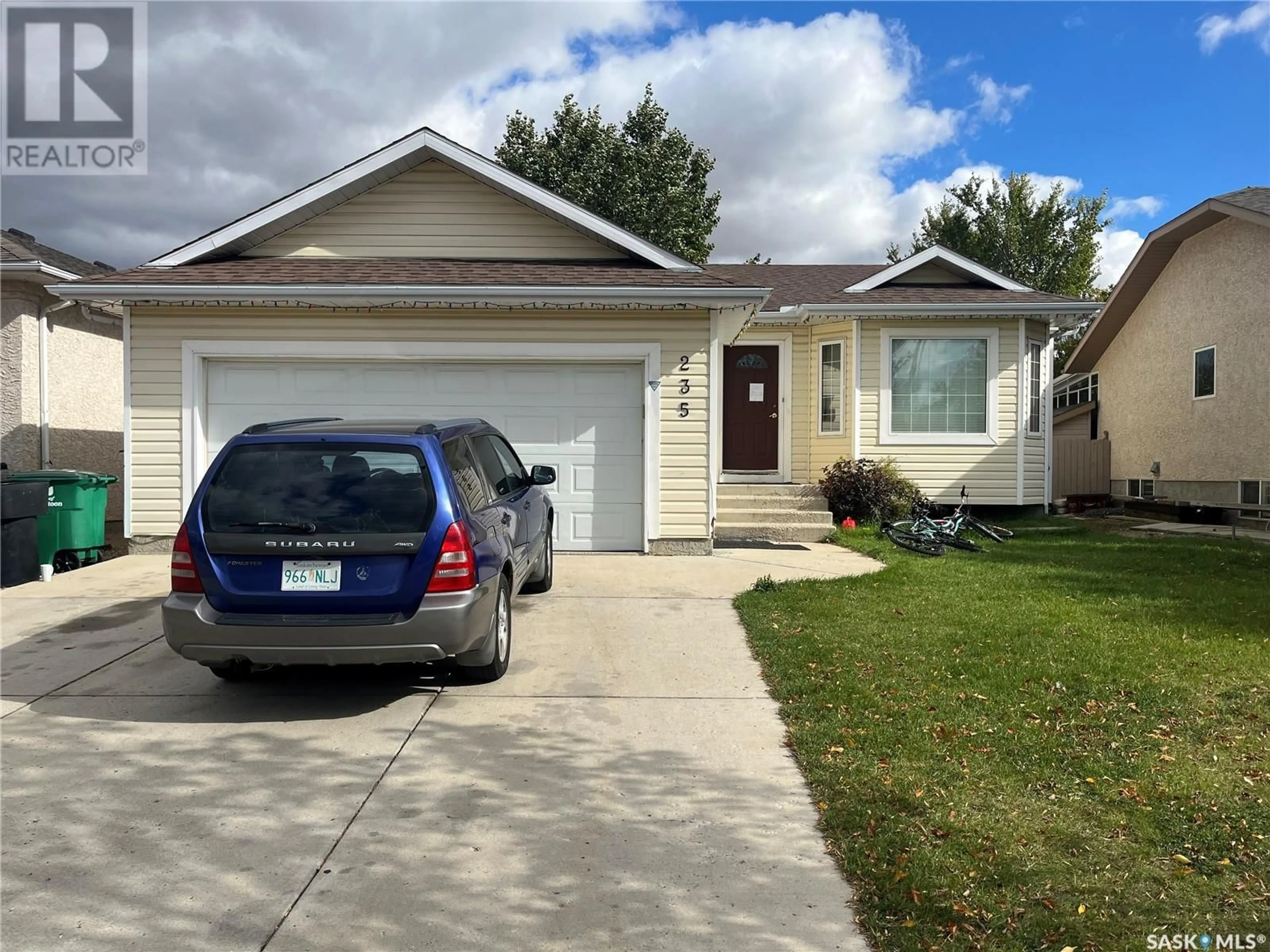 Home with vinyl exterior material for 235 Beerling CRESCENT, Saskatoon Saskatchewan S7S1K4