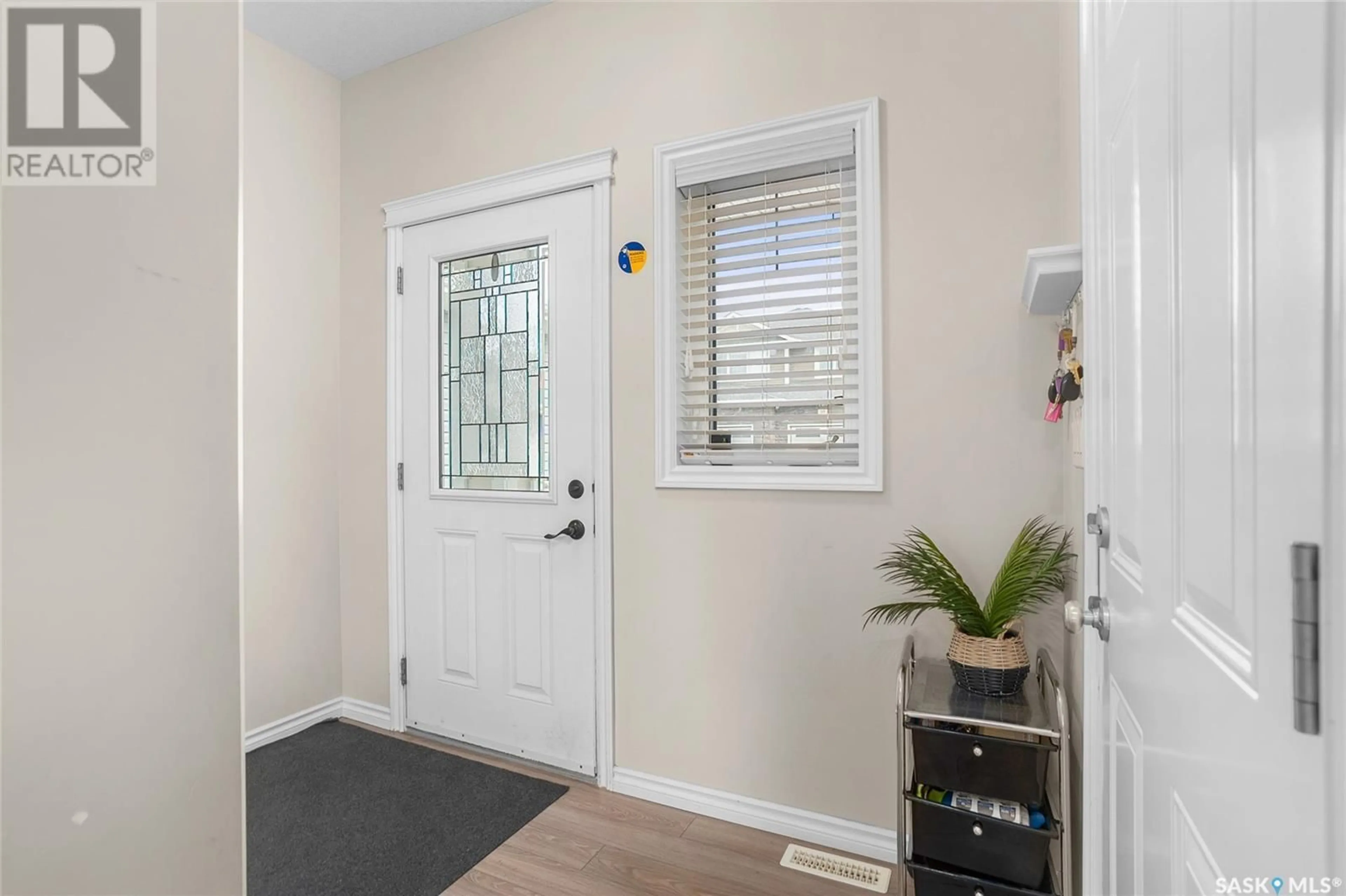 Indoor entryway, wood floors for 4 115 Veltkamp CRESCENT, Saskatoon Saskatchewan S7T0T7