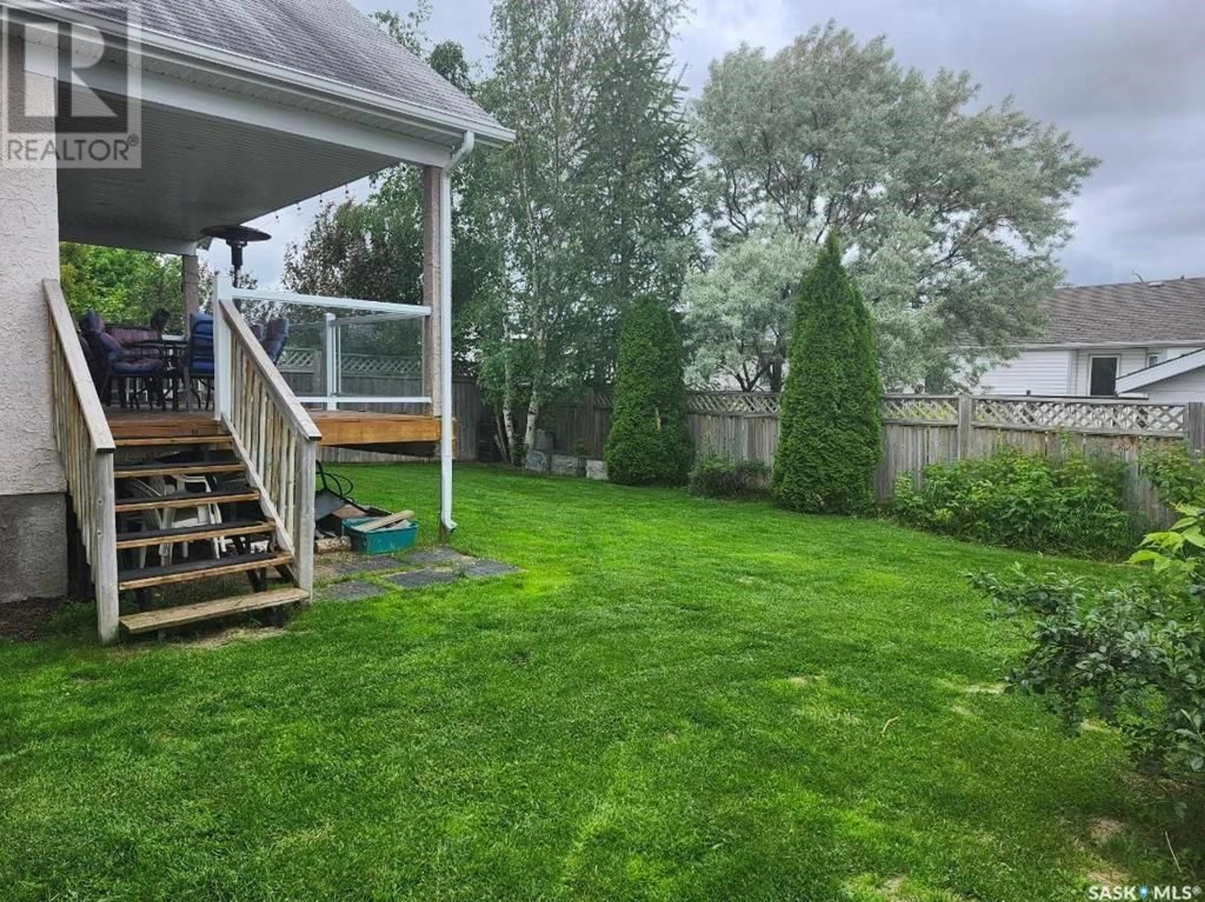 Patio, the fenced backyard for 15 Longpre CRESCENT, Prince Albert Saskatchewan S6X1C7