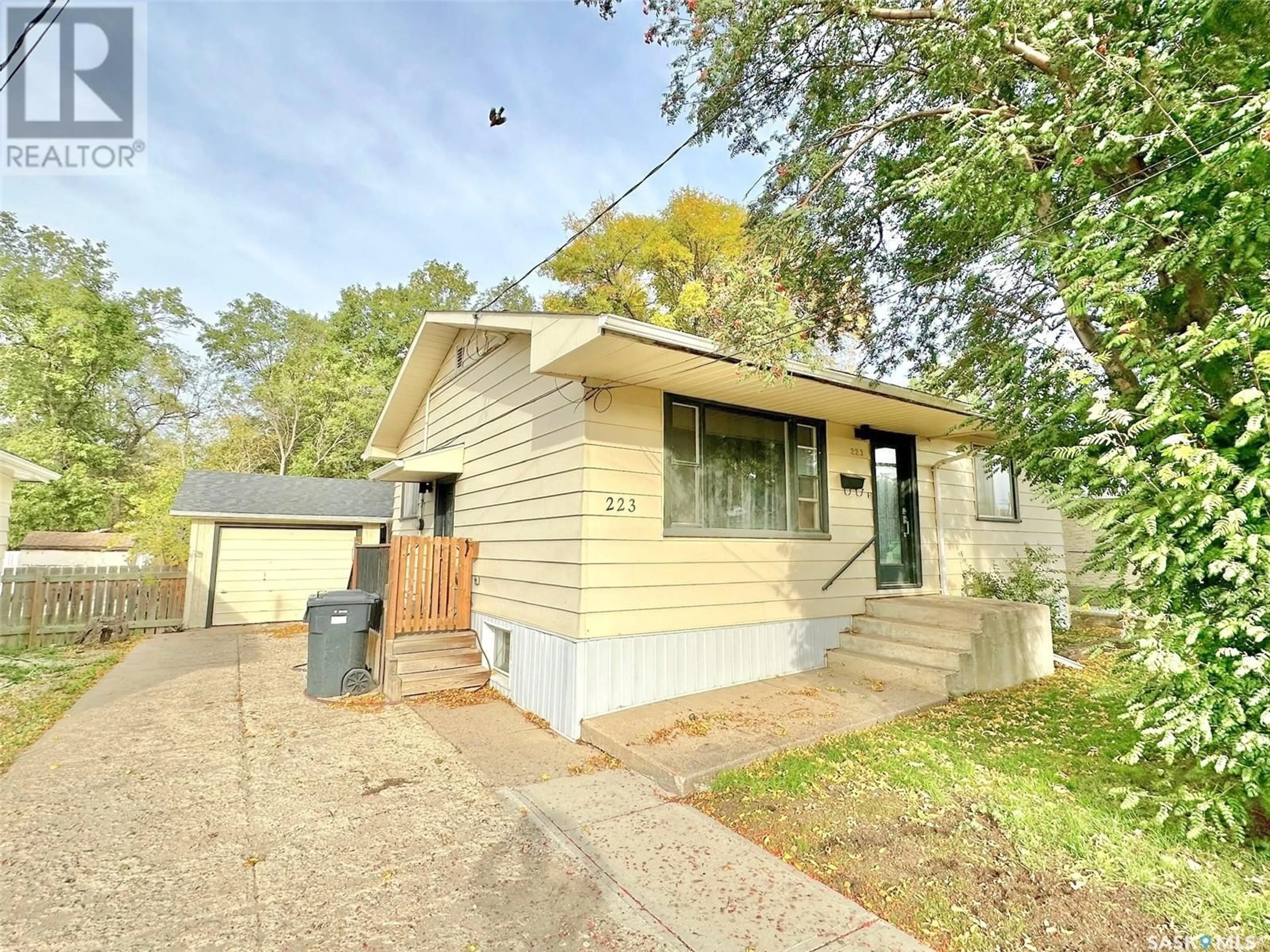 Frontside or backside of a home for 223 4TH STREET, Weyburn Saskatchewan S4H0Y4