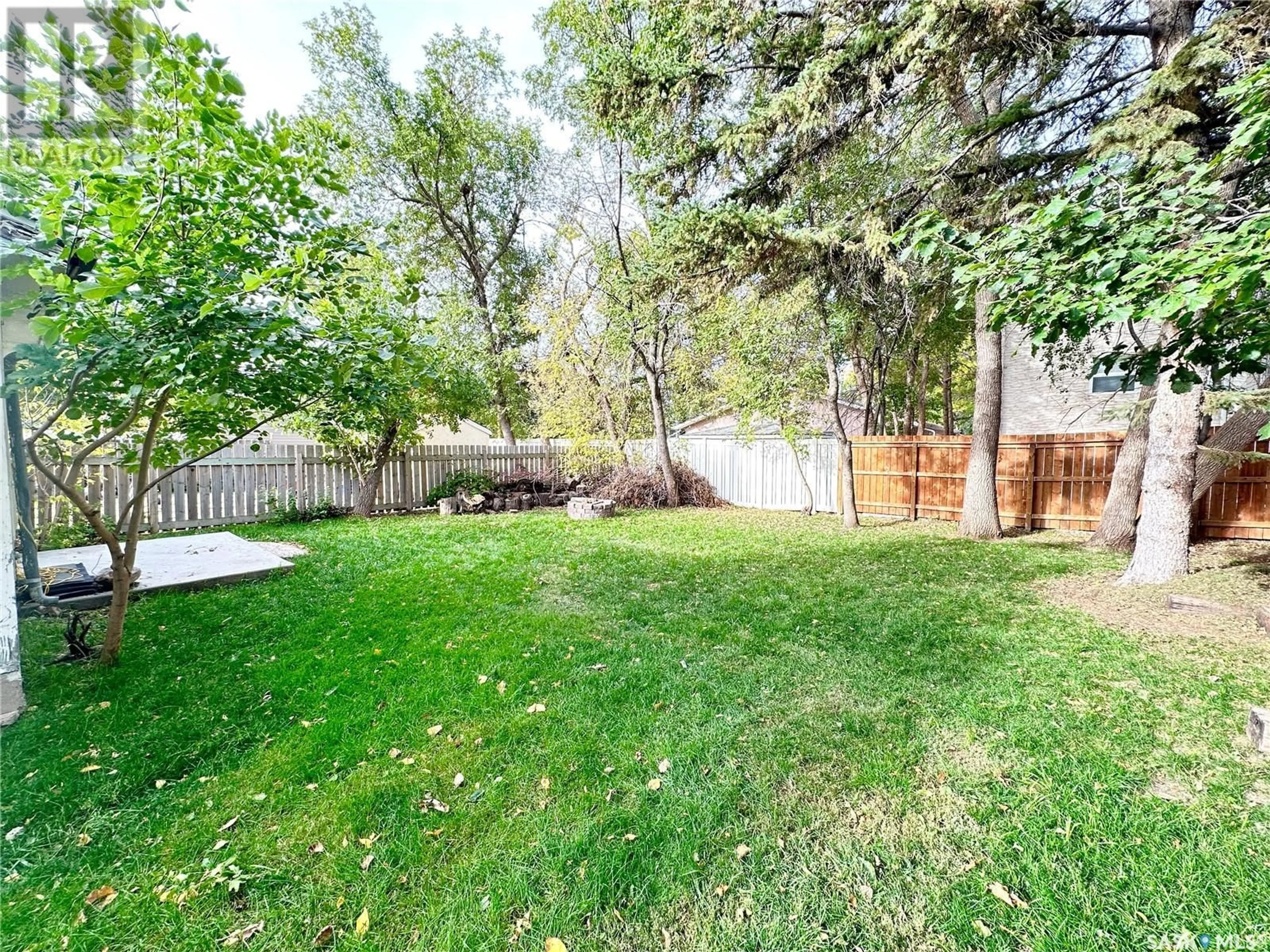 Patio, the fenced backyard for 223 4TH STREET, Weyburn Saskatchewan S4H0Y4