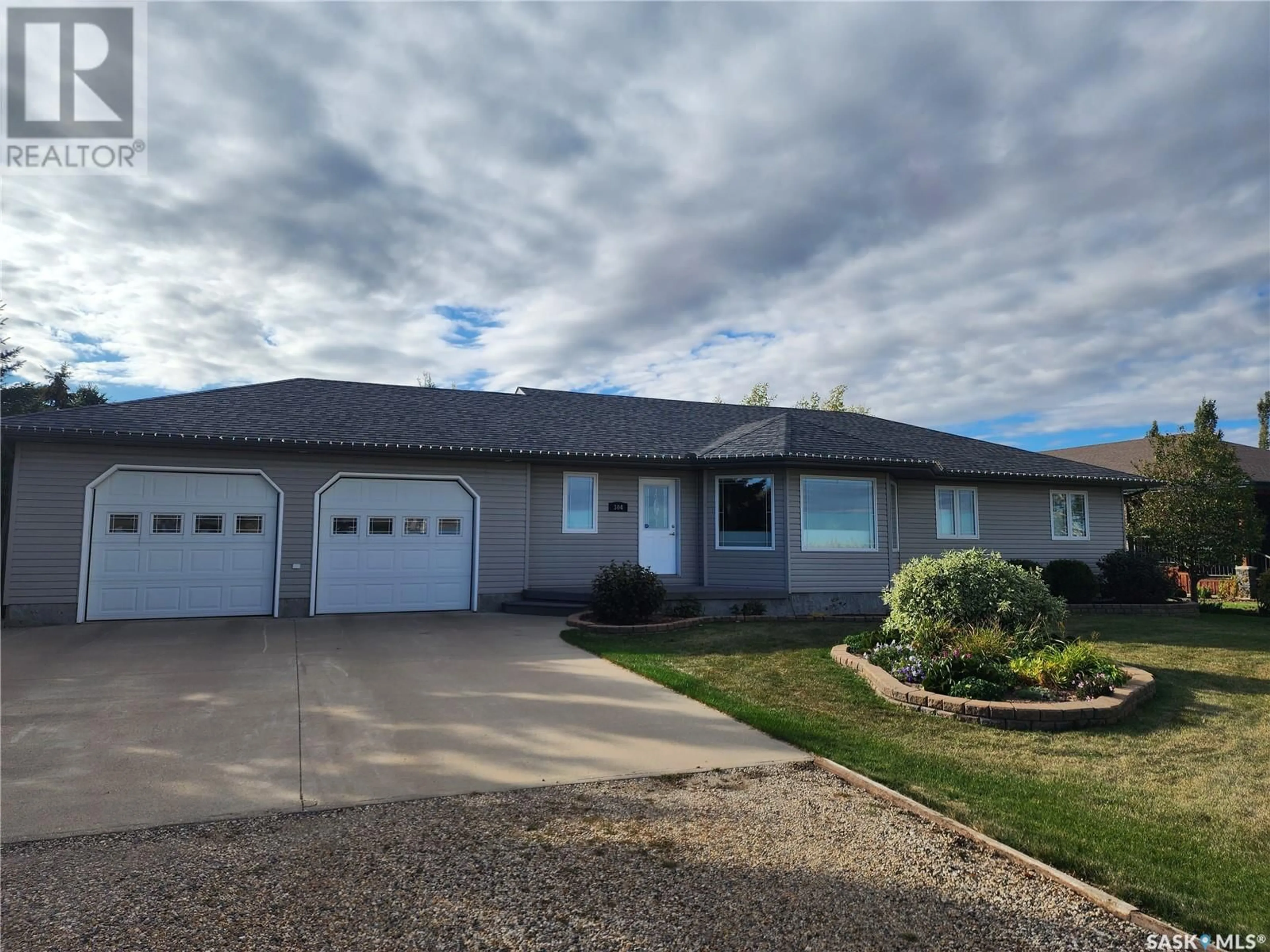 Home with vinyl exterior material, street for 304 ANDERSON STREET, Grenfell Saskatchewan S0G2B0