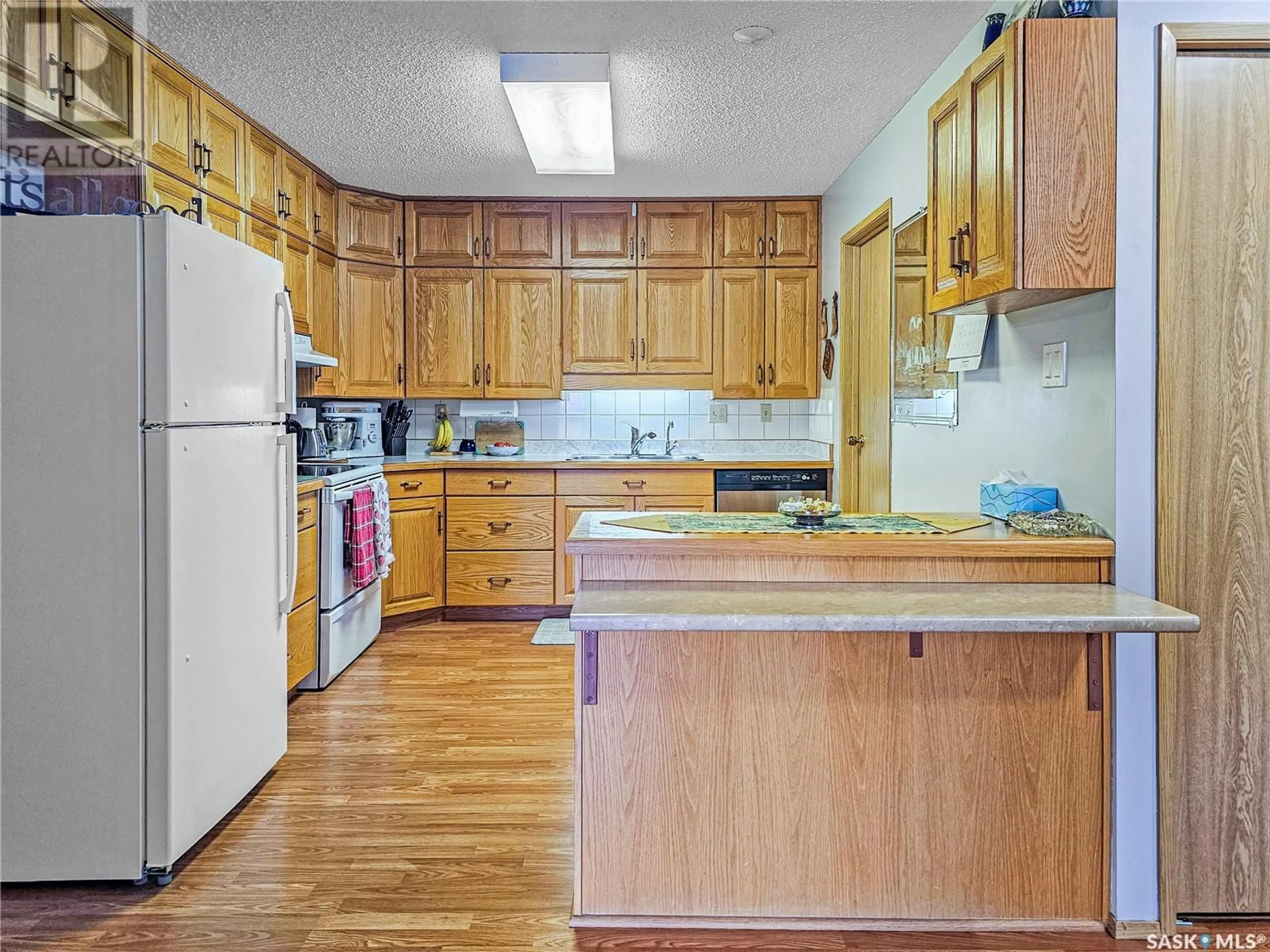 Standard kitchen, wood floors, cottage for 303 360 Cypress DRIVE, Swift Current Saskatchewan S9H4Z9