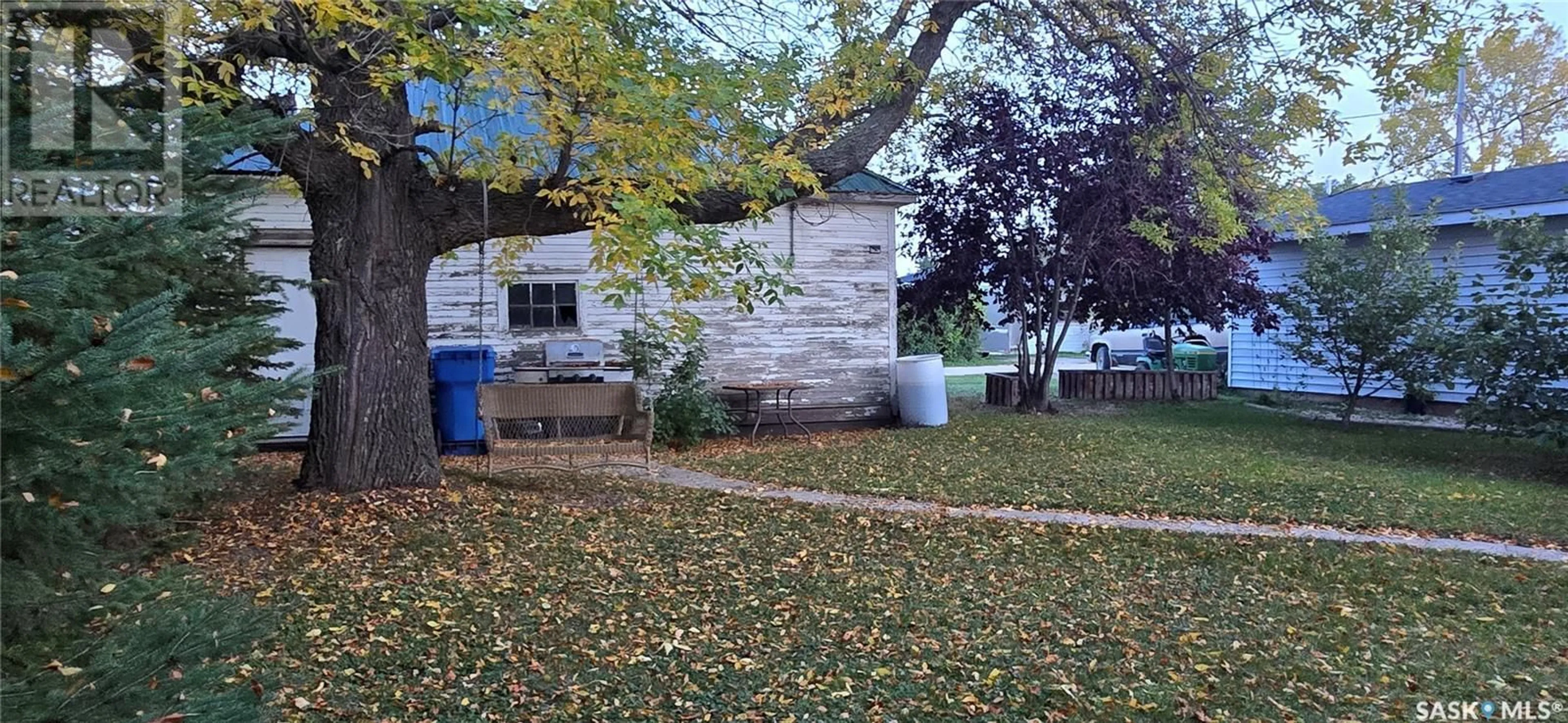 Frontside or backside of a home, the fenced backyard for 69 Main STREET, Fillmore Saskatchewan S0G1N0