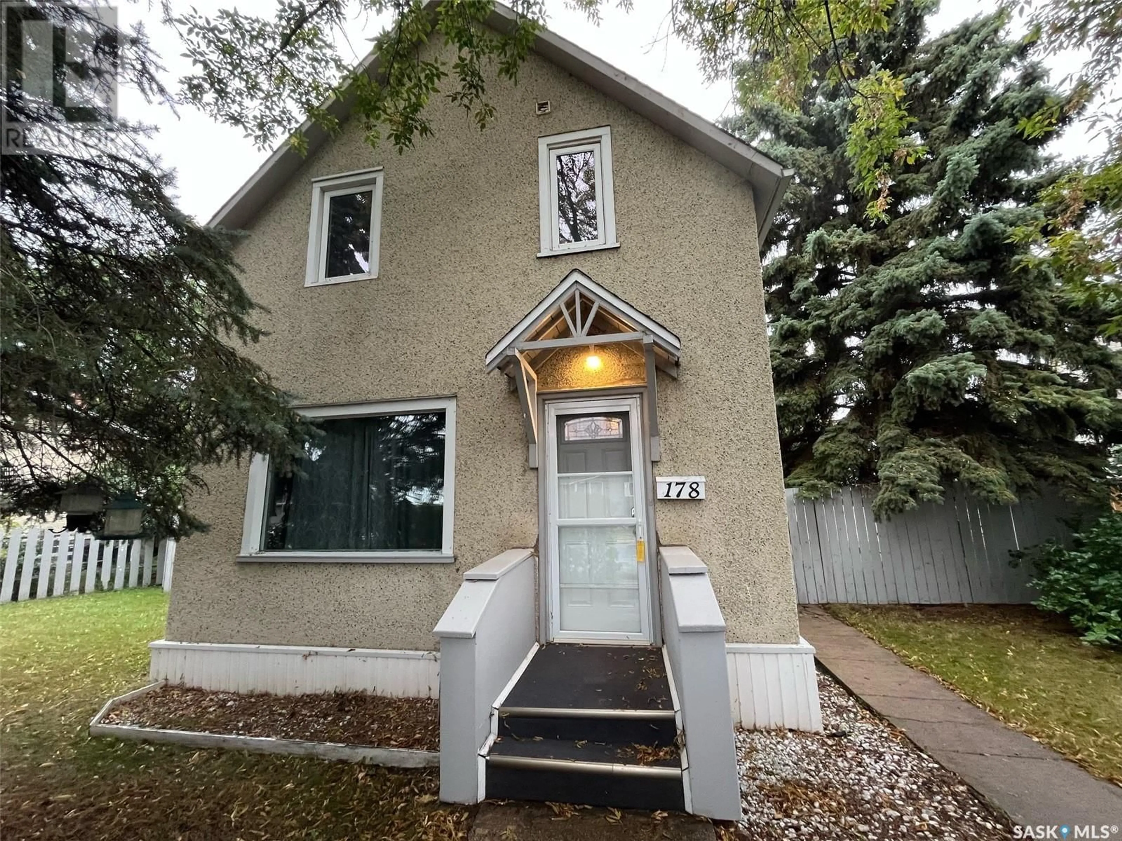 Home with vinyl exterior material, street for 178 6TH STREET, Prince Albert Saskatchewan S6V0M8