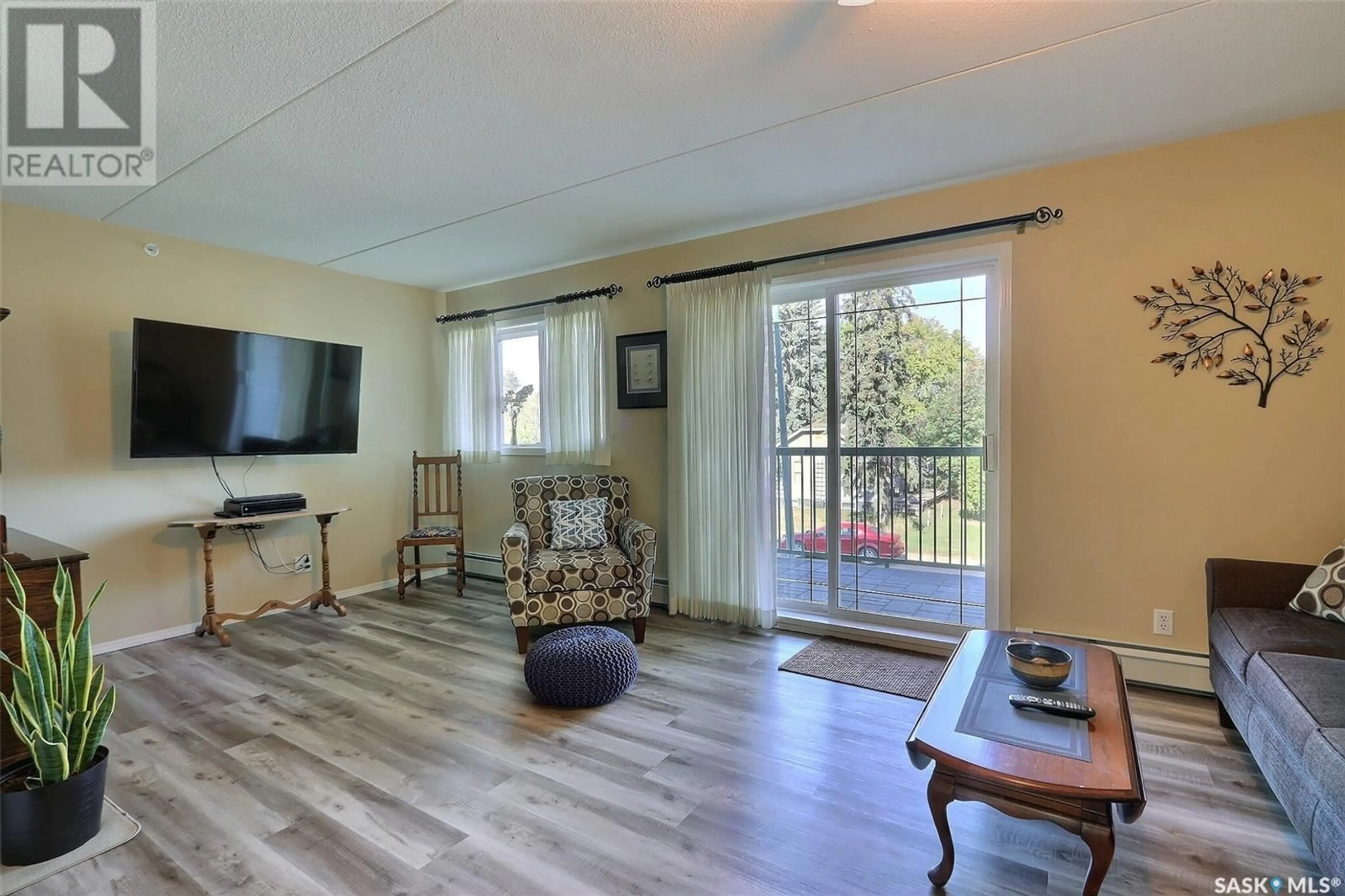 A pic of a room, wood floors for 201 1 26th STREET E, Prince Albert Saskatchewan S6V1T7