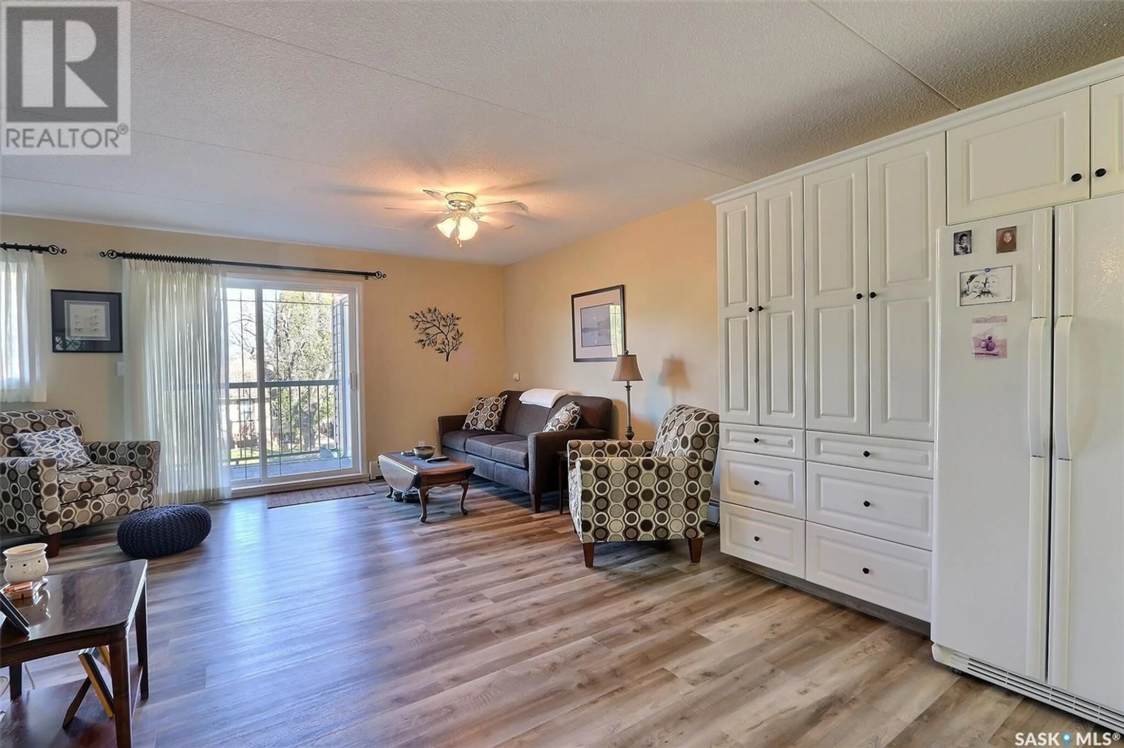 A pic of a room, wood floors for 201 1 26th STREET E, Prince Albert Saskatchewan S6V1T7