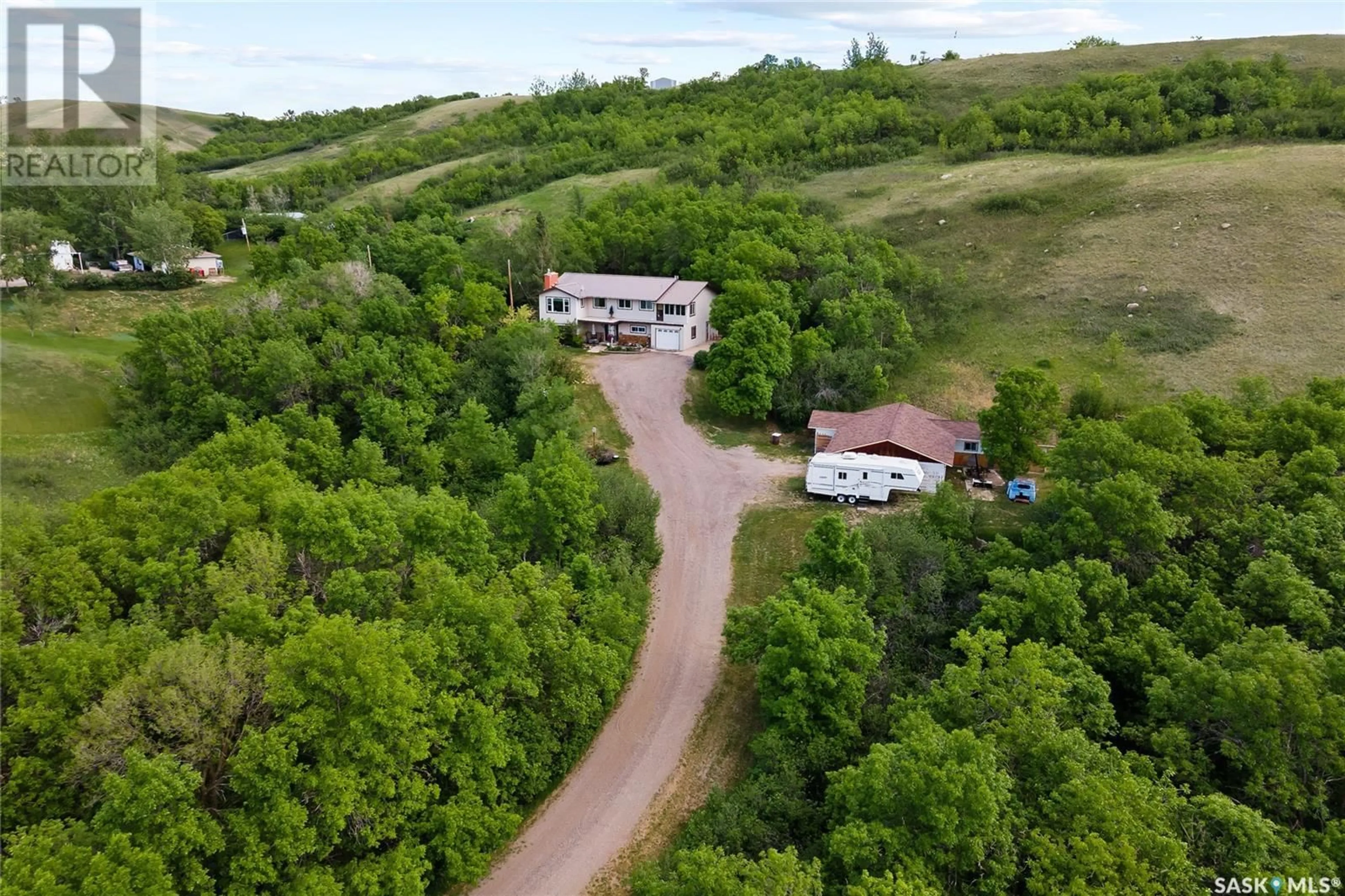A pic from outside/outdoor area/front of a property/back of a property/a pic from drone, unknown for RM of Longlaketon No. 219 - Bechard ACREAGE, Longlaketon Rm No. 219 Saskatchewan S0G0W0