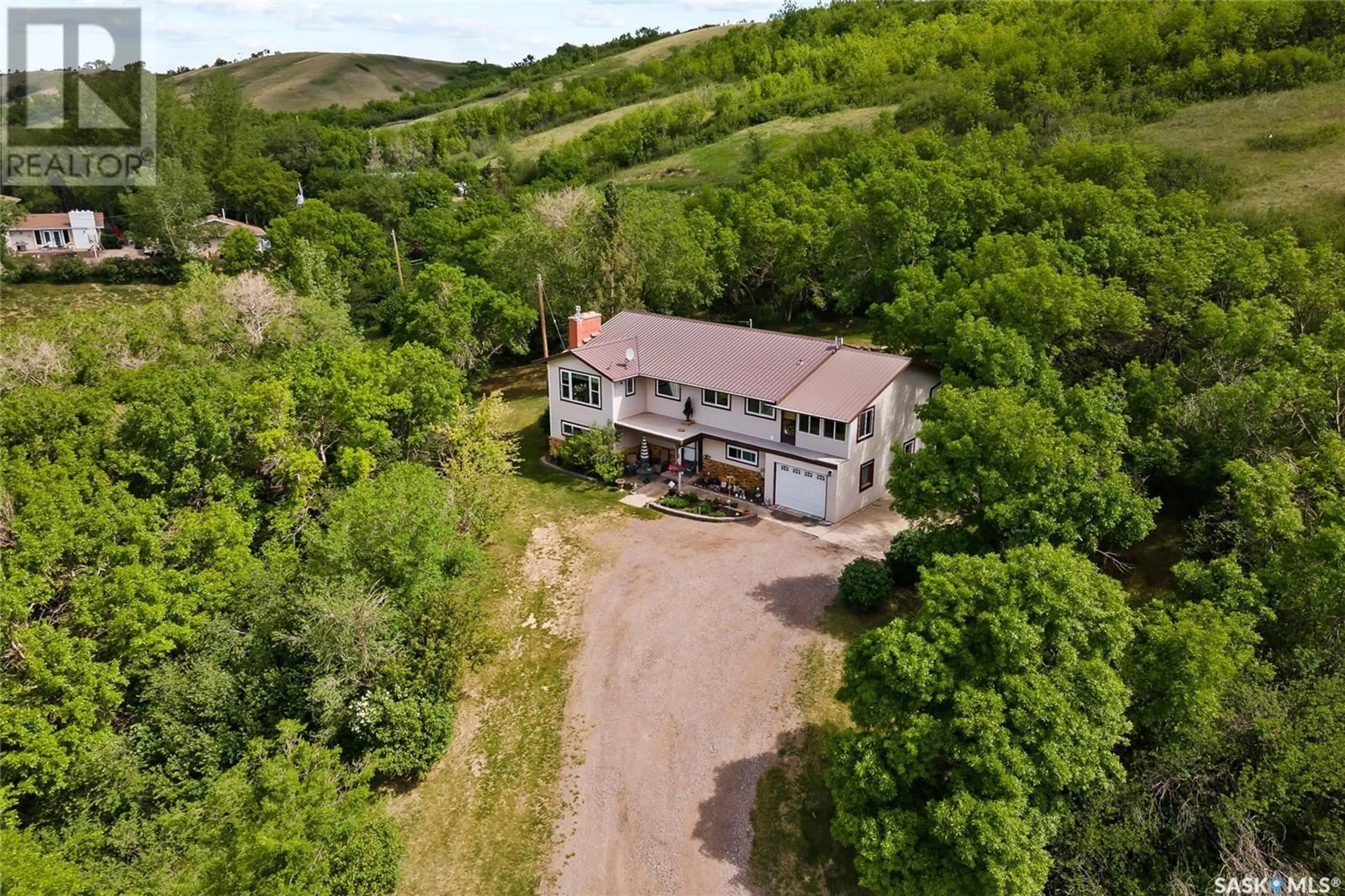 A pic from outside/outdoor area/front of a property/back of a property/a pic from drone, unknown for RM of Longlaketon No. 219 - Bechard ACREAGE, Longlaketon Rm No. 219 Saskatchewan S0G0W0